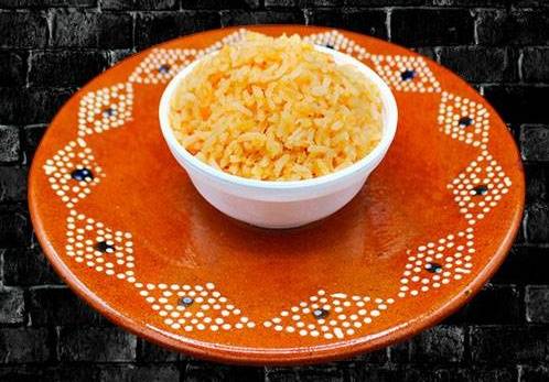 Order Rice (8 oz) food online from RIVAS MEXICAN GRILL store, Fort Mohave on bringmethat.com
