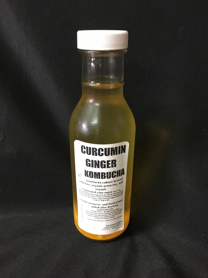 Order Curcumin Ginger Kombucha food online from Pat Greer's Kitchen store, Houston on bringmethat.com