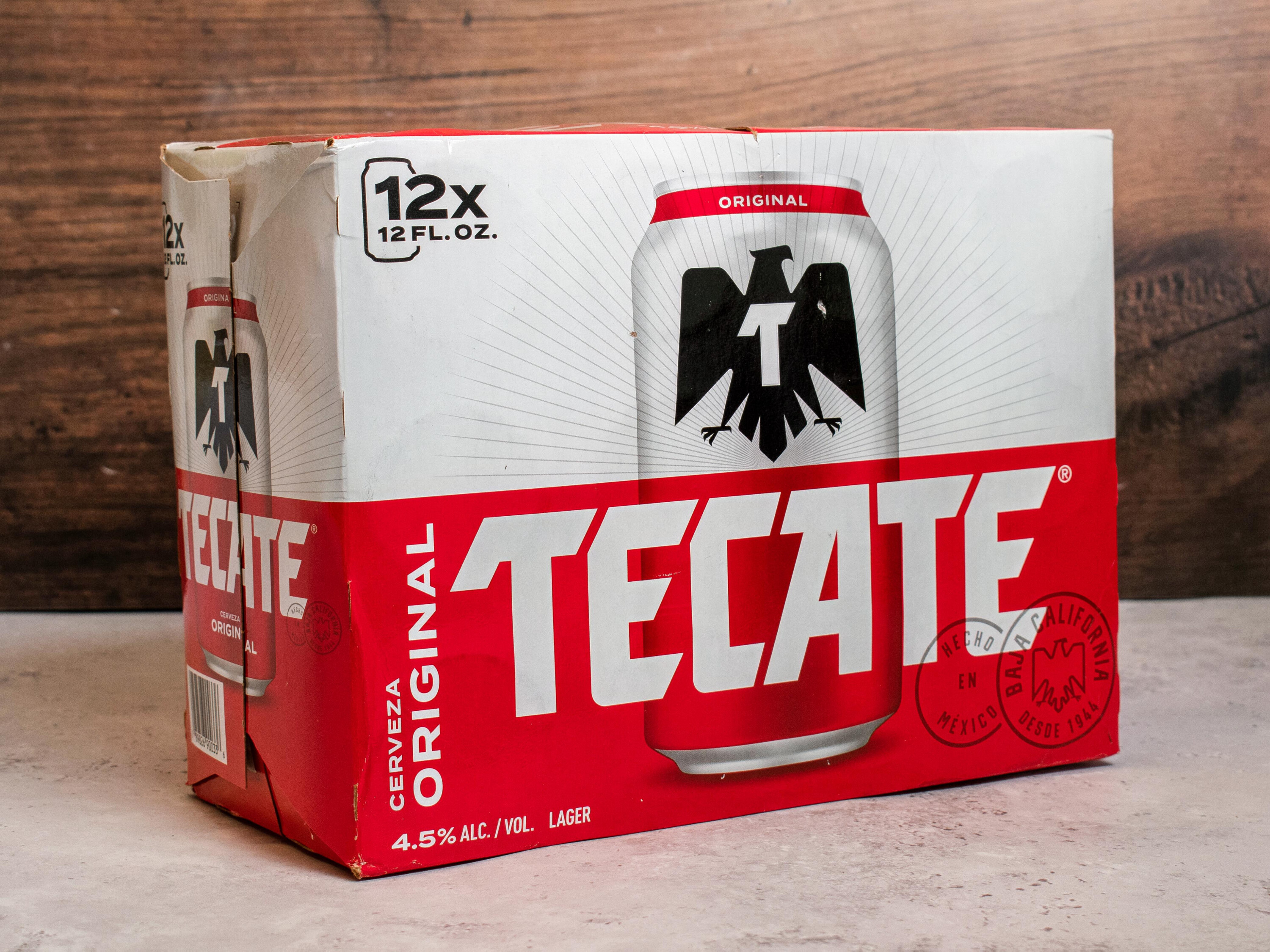 Order 12 pack of 12 oz Tecate original canned Beer  food online from Vic Liquors store, El Monte on bringmethat.com