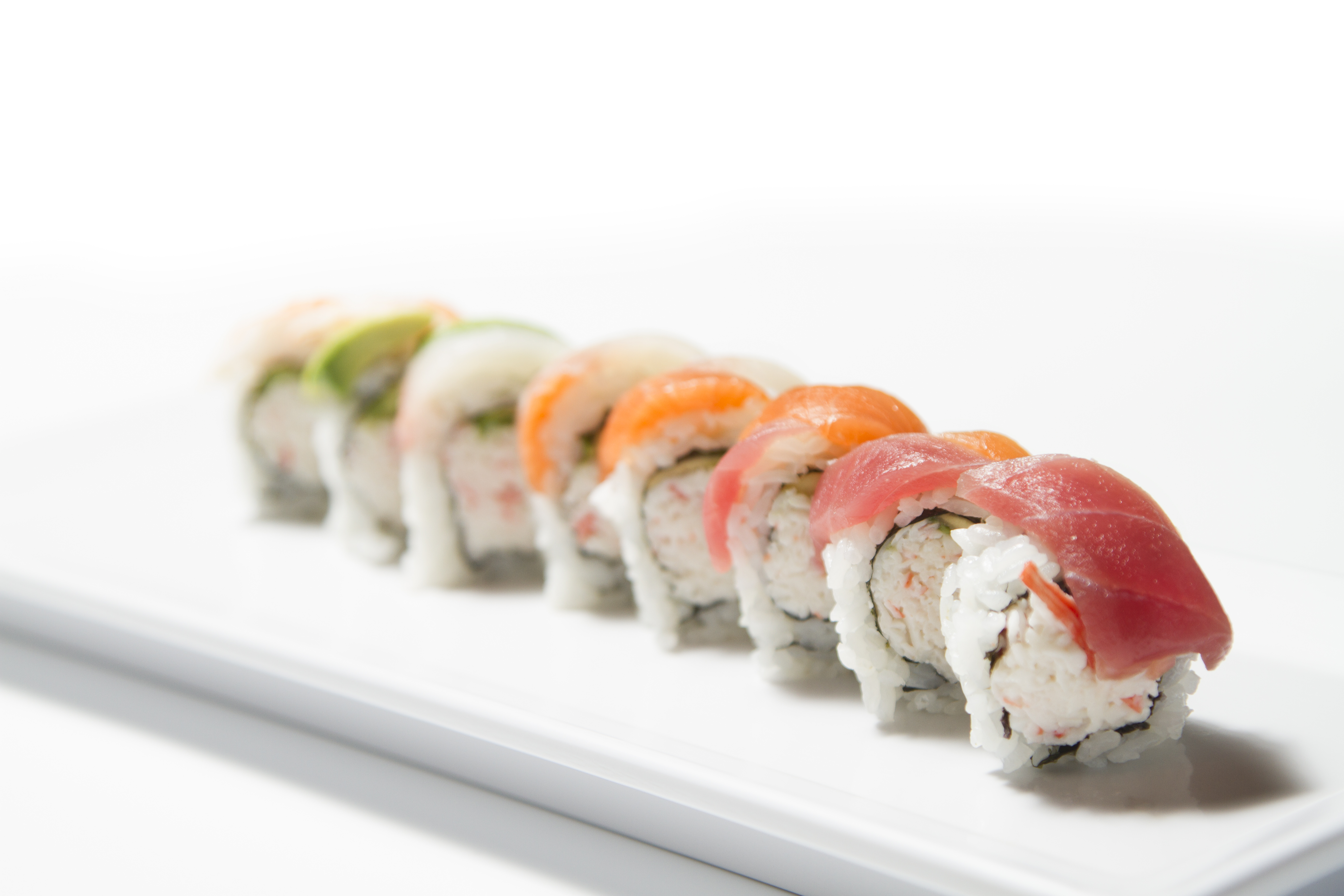 Order Rainbow Roll food online from Suben Sushi+Bento store, Carrollton on bringmethat.com