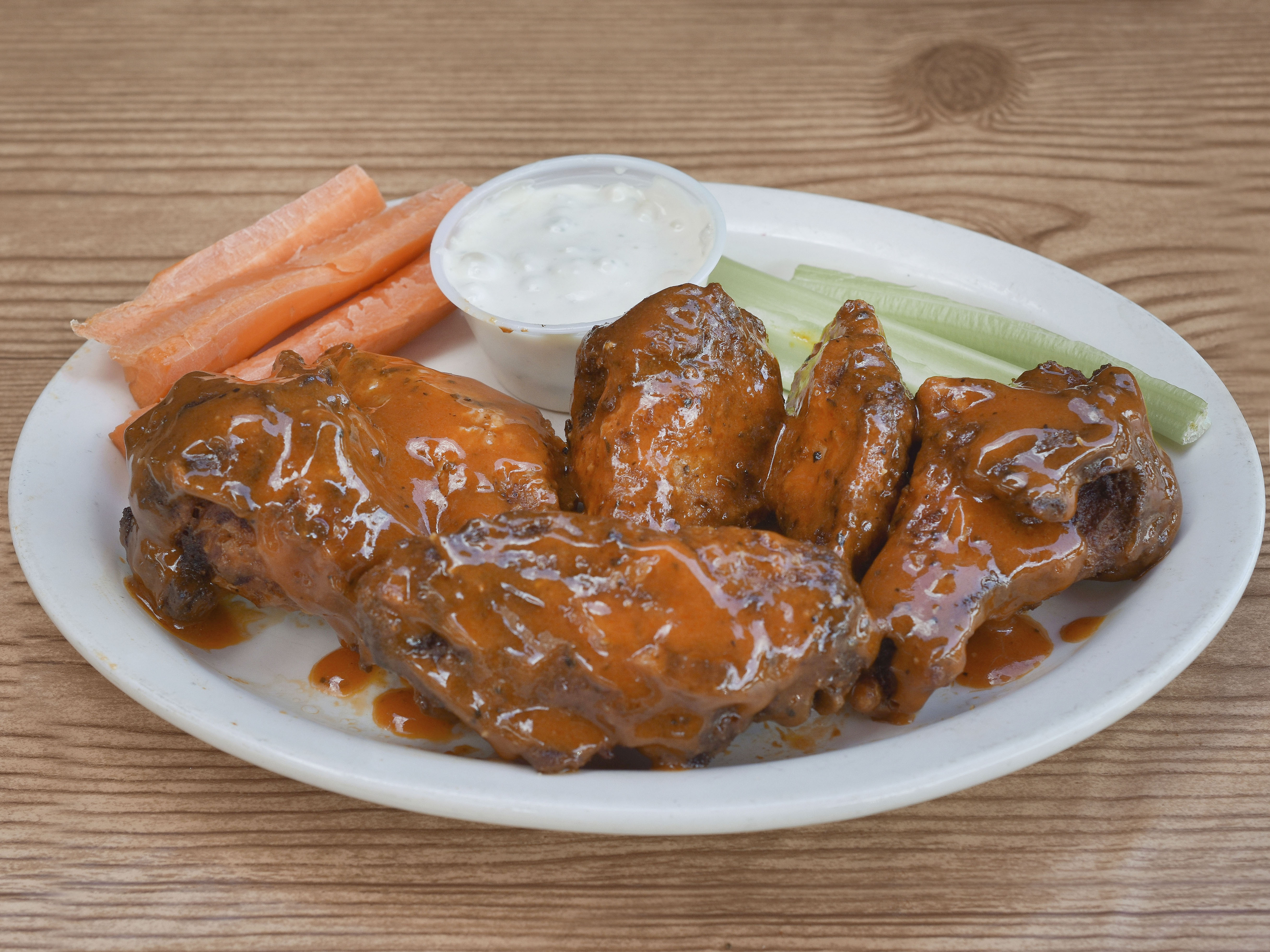 Order 1/2 Dozen Chicken Wings food online from Breakers Sports Grill store, Henrico on bringmethat.com