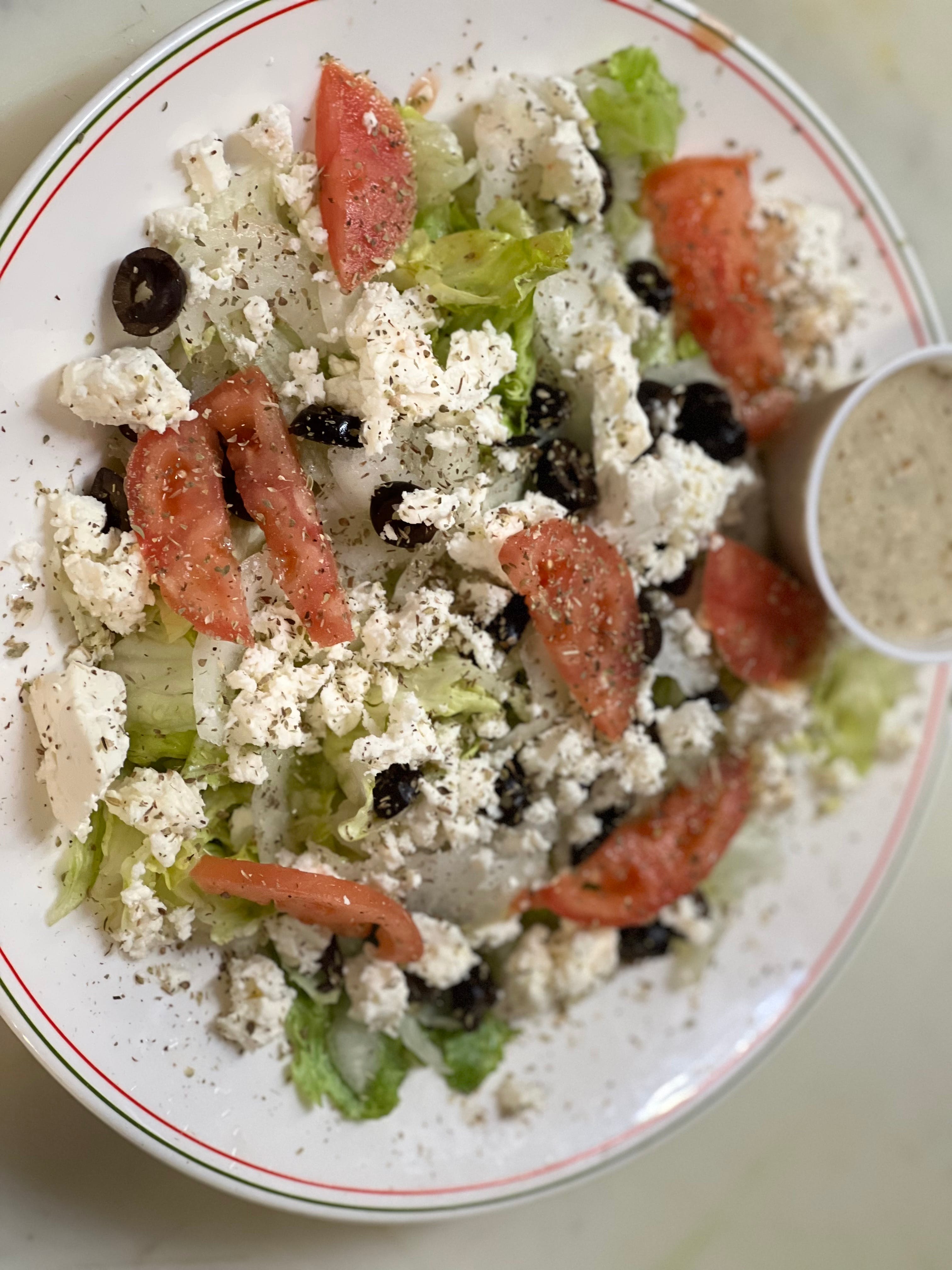 Order Greek Salad - Salads food online from Sal's Pizza store, Fond Du Lac on bringmethat.com