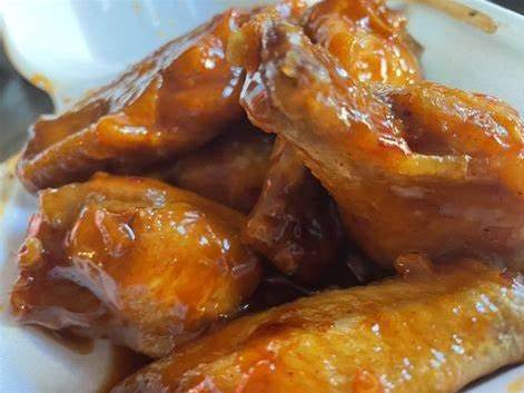 Order Bone In Wings (100 pcs) food online from Wings Over Seagoville store, Seagoville on bringmethat.com