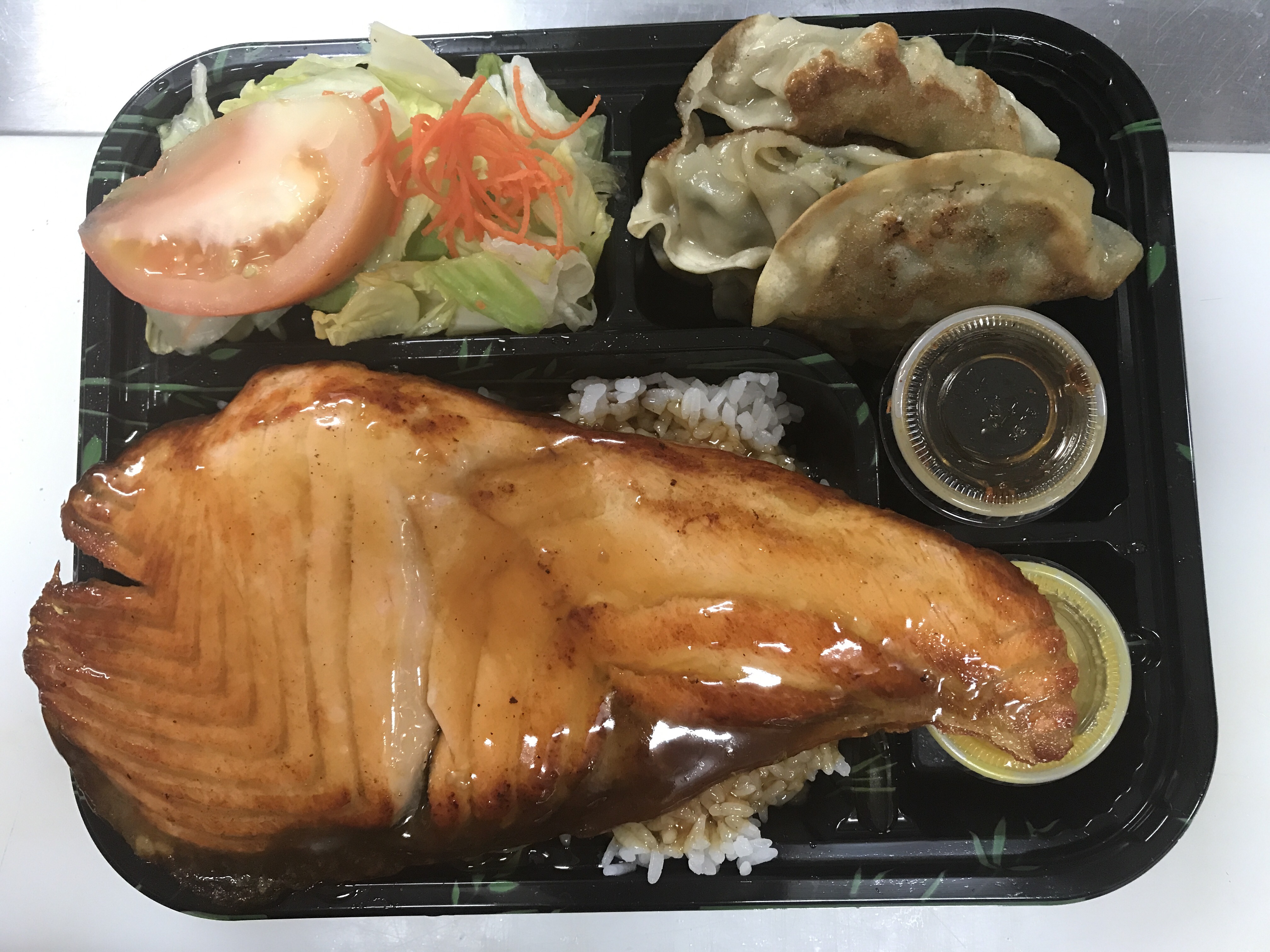 Order 12. Salmon Teriyaki and Gyoza Combo food online from Aburi sushi bar store, Brooklyn on bringmethat.com