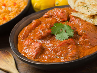 Order Chicken Tikka Masala food online from Gourmet India store, Houston on bringmethat.com