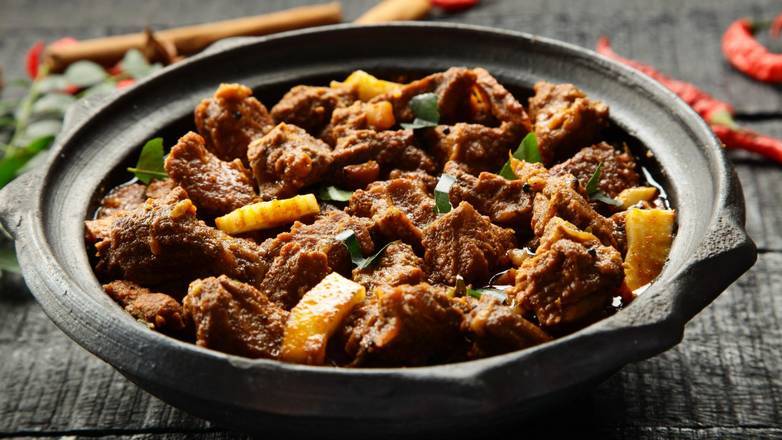 Order Goat Karahi food online from Indian Pizza Snob store, Pittsburgh on bringmethat.com
