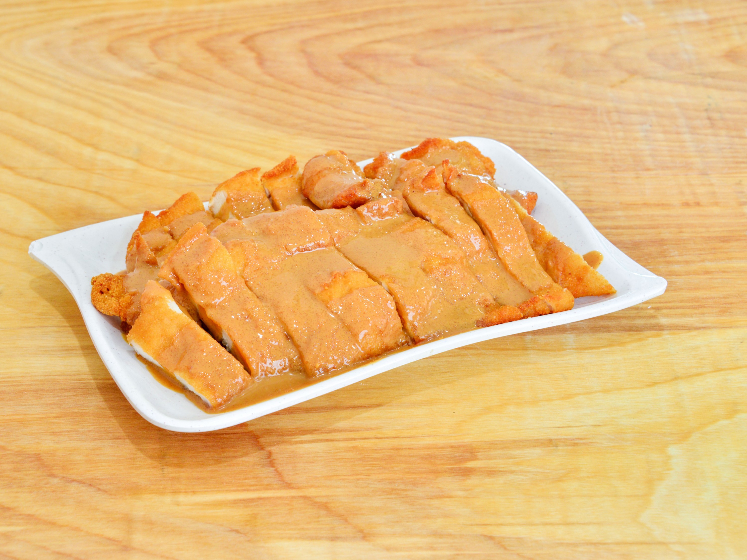 Order 42c. Peanut Butter Chicken food online from Hong Kong Buffet Sushi Hibachi Lounge store, Wadsworth on bringmethat.com