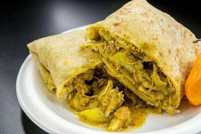 Order Roti food online from Island Tingz Caribbean Grill store, Humble, Houston on bringmethat.com