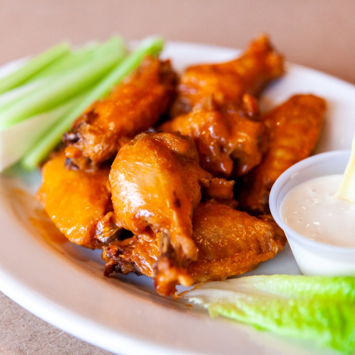 Order Jumbo Buffalo Wings - 6 Pieces food online from Planet Pizza store, Shelton on bringmethat.com