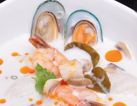 Order S12. Tom Kha Seafood Soup food online from Sawasdee Thai Cuisine store, Ventura on bringmethat.com
