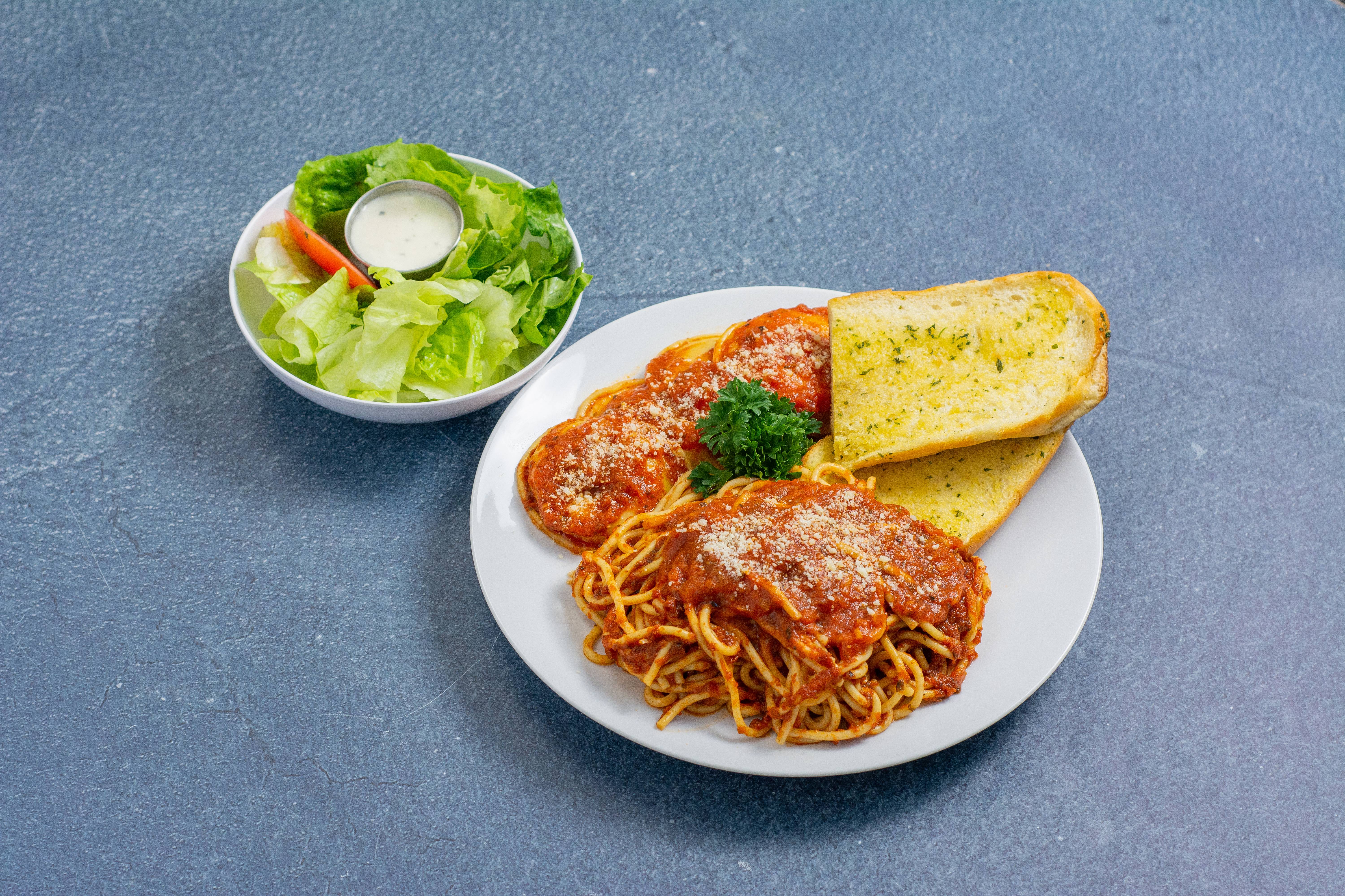 Order 1/2 Spaghetti and 1/2 Meat Ravioli food online from Gumba's store, Sunnyvale on bringmethat.com