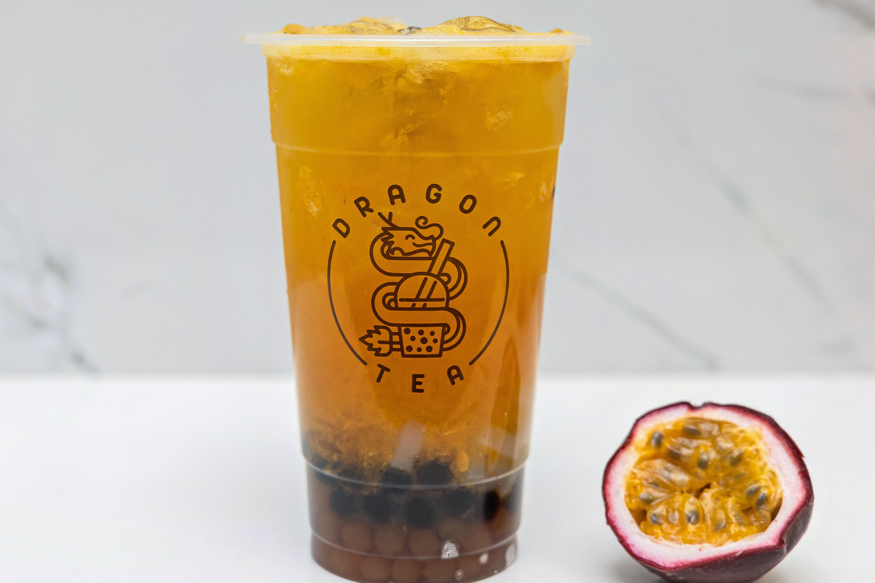 Order Passion Fruit Jasmine Green Tea w/ 3 Toppings Brown * food online from Dragon Tea store, New York on bringmethat.com