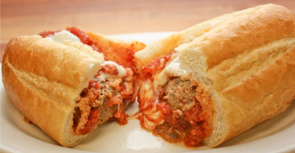 Order Italian Sausage Sub - Small food online from Golden Pizzeria store, Norfolk on bringmethat.com