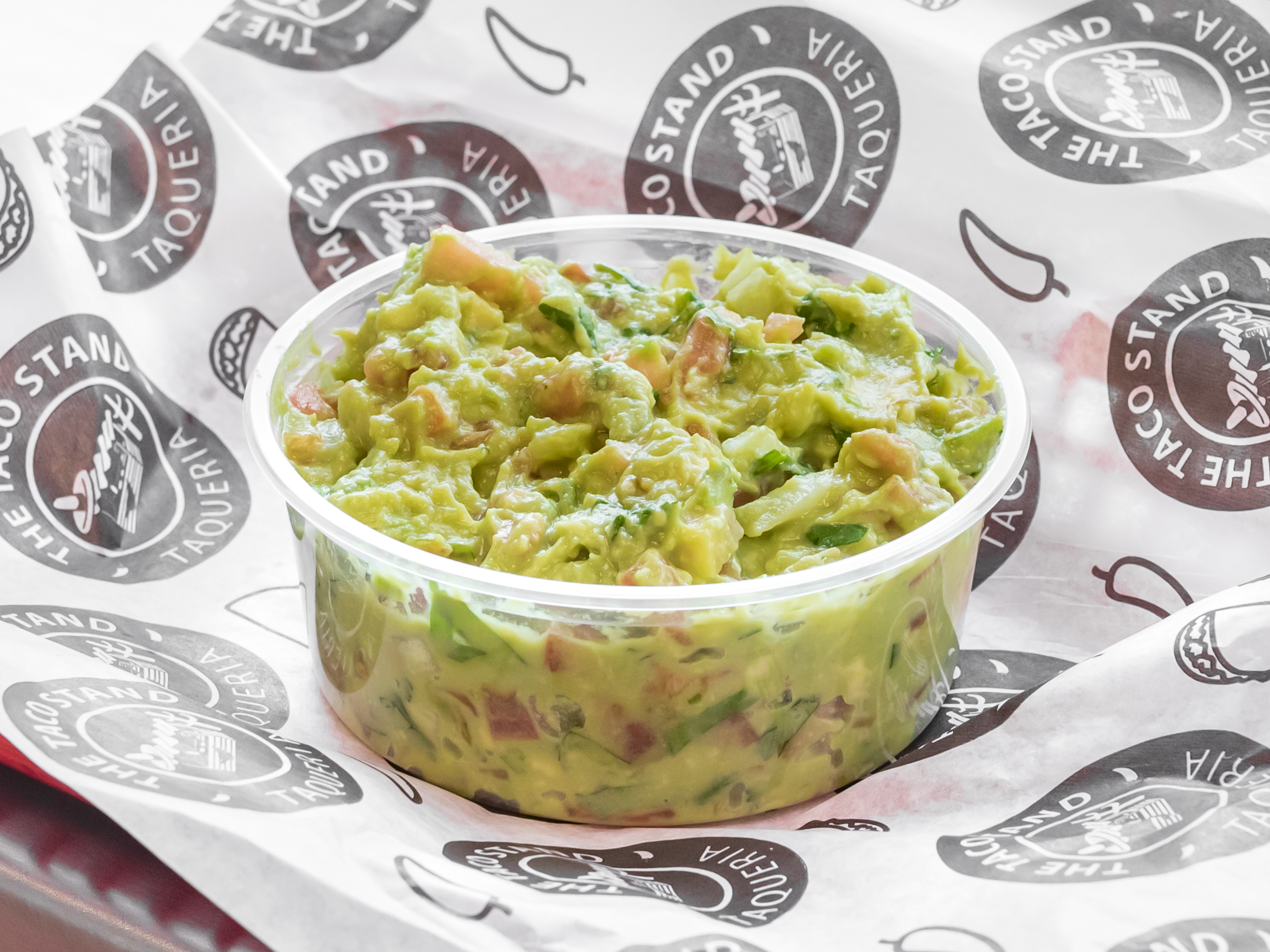 Order 8 oz. Guacamole food online from The Taco Stand store, Garden City on bringmethat.com