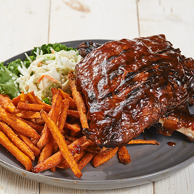 Order Baby Back Ribs food online from Wood-n-Tap - Vernon store, Vernon on bringmethat.com