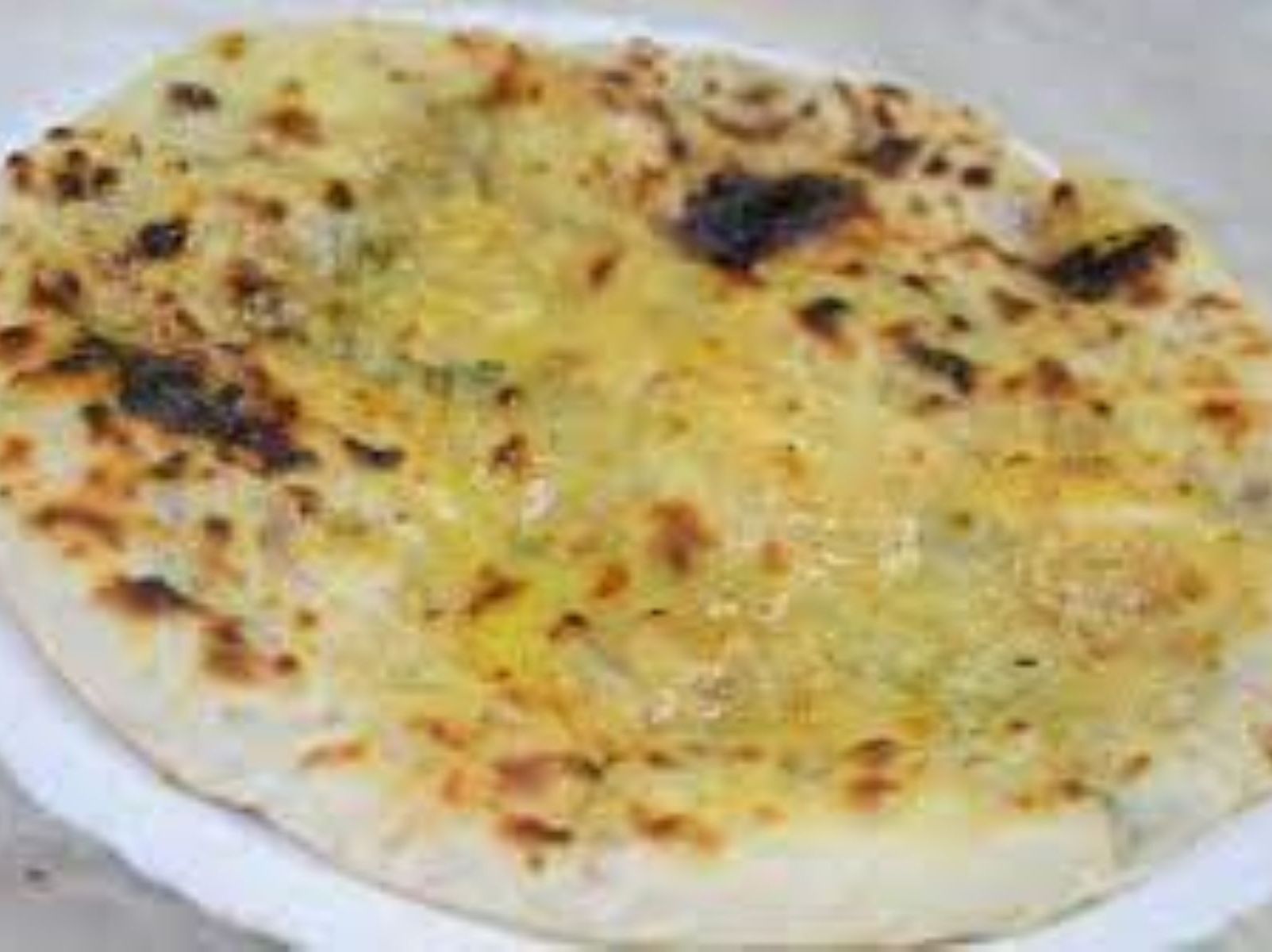 Order Aloo Naan food online from Passage to India store, Cambridge on bringmethat.com