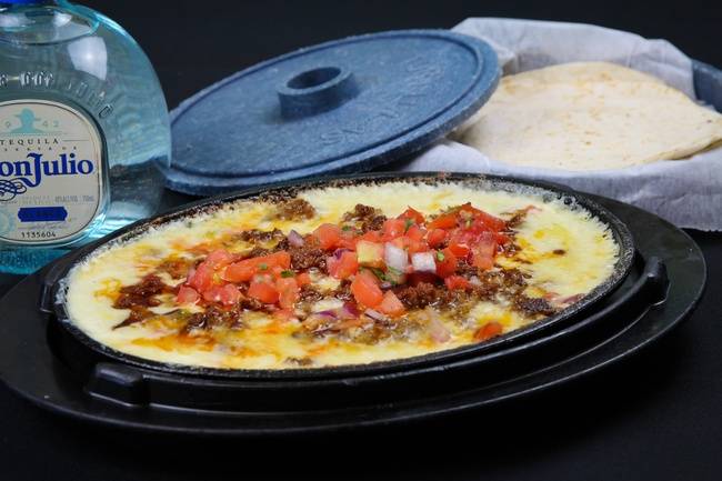 Order Queso Fundido food online from Cuco Taqueria store, Columbus on bringmethat.com
