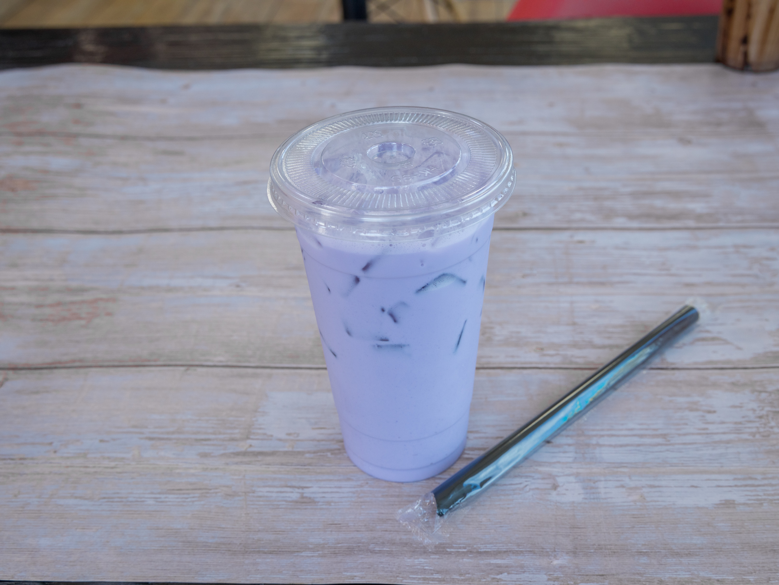 Order Taro Milk Tea  food online from Lone Star Market store, Humble on bringmethat.com