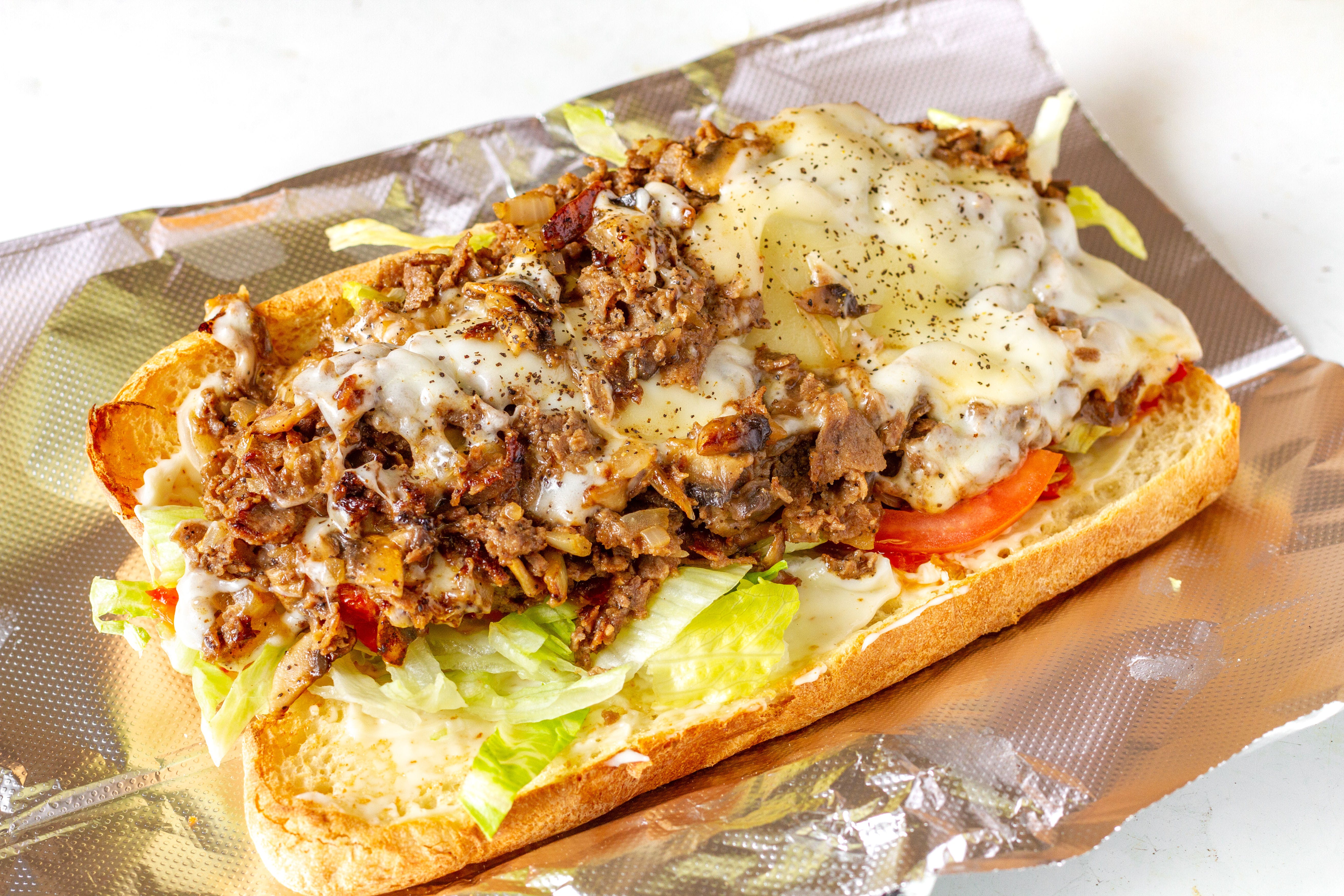 Order Italian Cheesesteak Sub - Half 8'' food online from Mikie's Pizza & Subs store, Baltimore on bringmethat.com