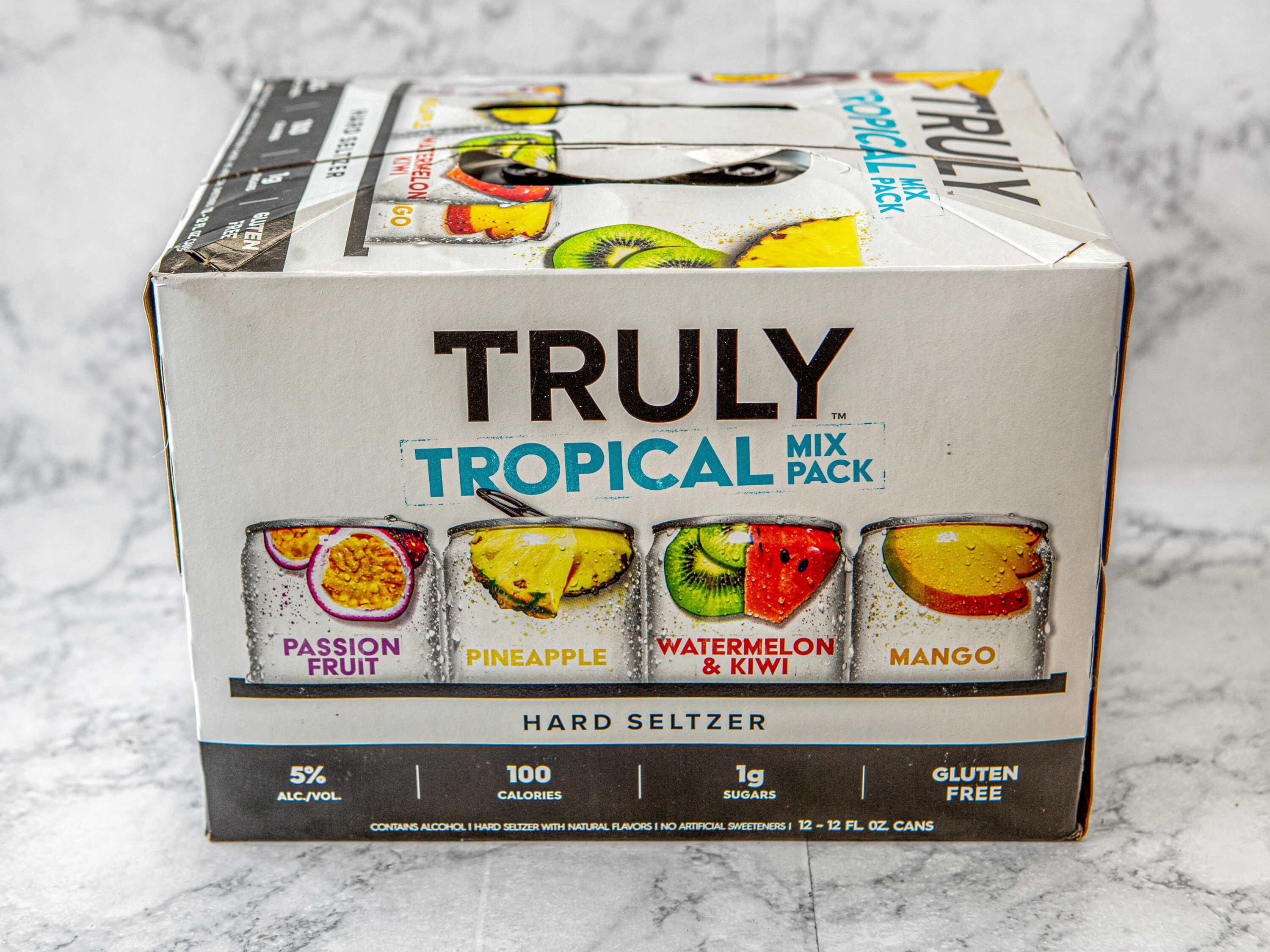 Order Truly Hard Seltzer Margarita Variety Pack , 12 Pack - 12 oz. Canned Spiked Sparkling Water, 5.0% ABV food online from Day & Night Liquor & Market store, Venice on bringmethat.com