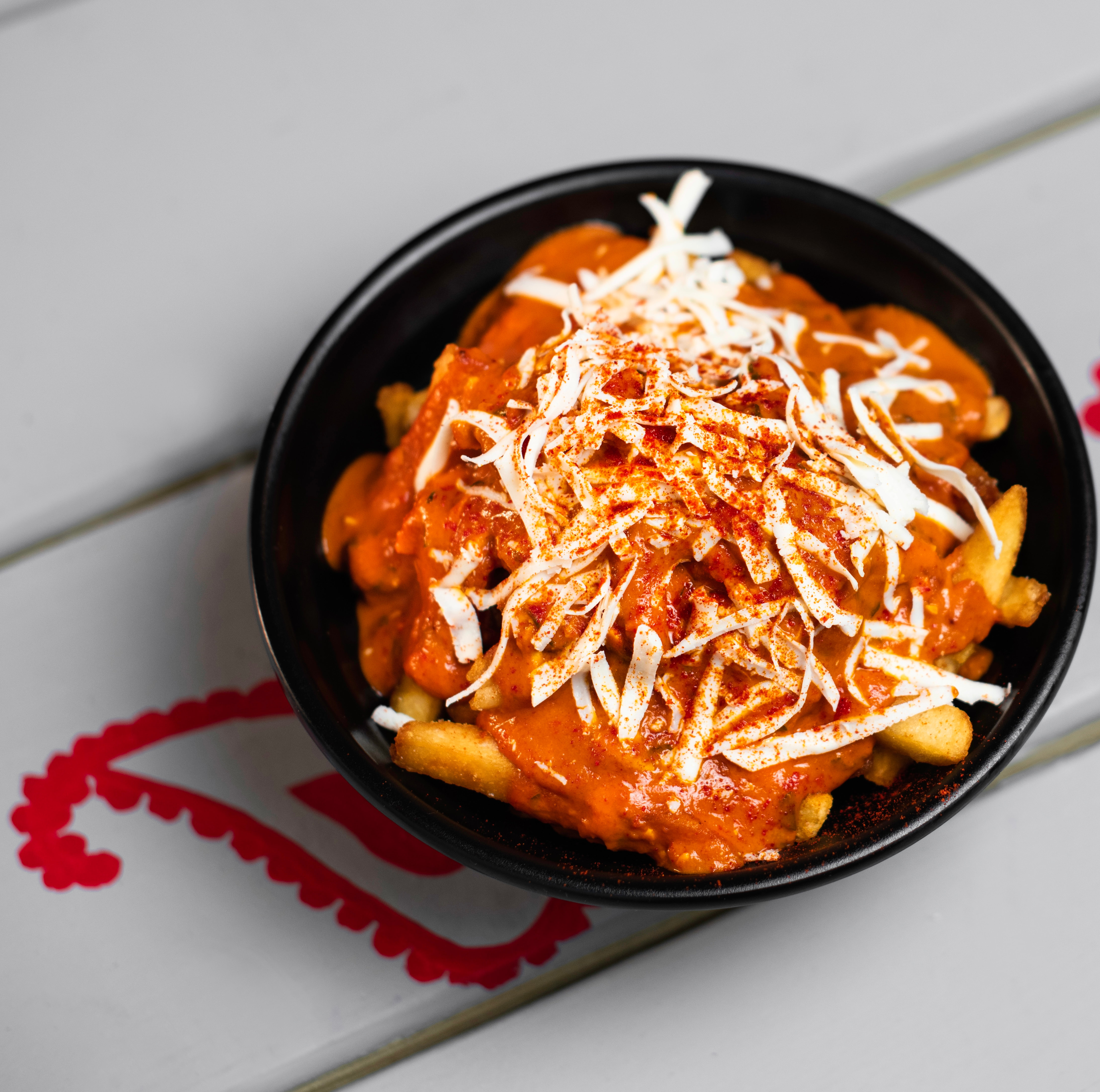 Order Desipoutine™ food online from Desi Galli store, New York on bringmethat.com