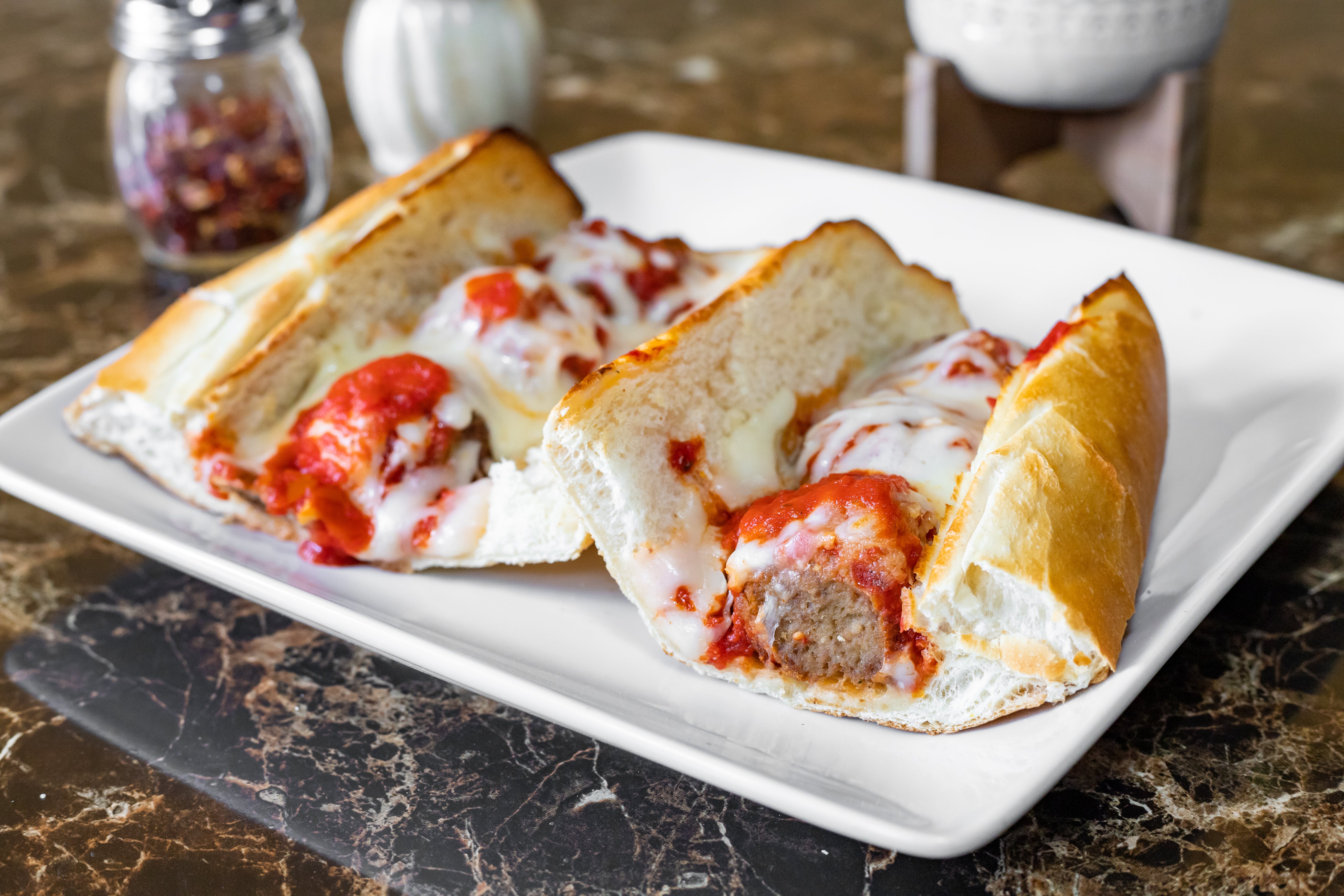 Order Meatball Sub - 10" food online from Basani's store, Miami on bringmethat.com