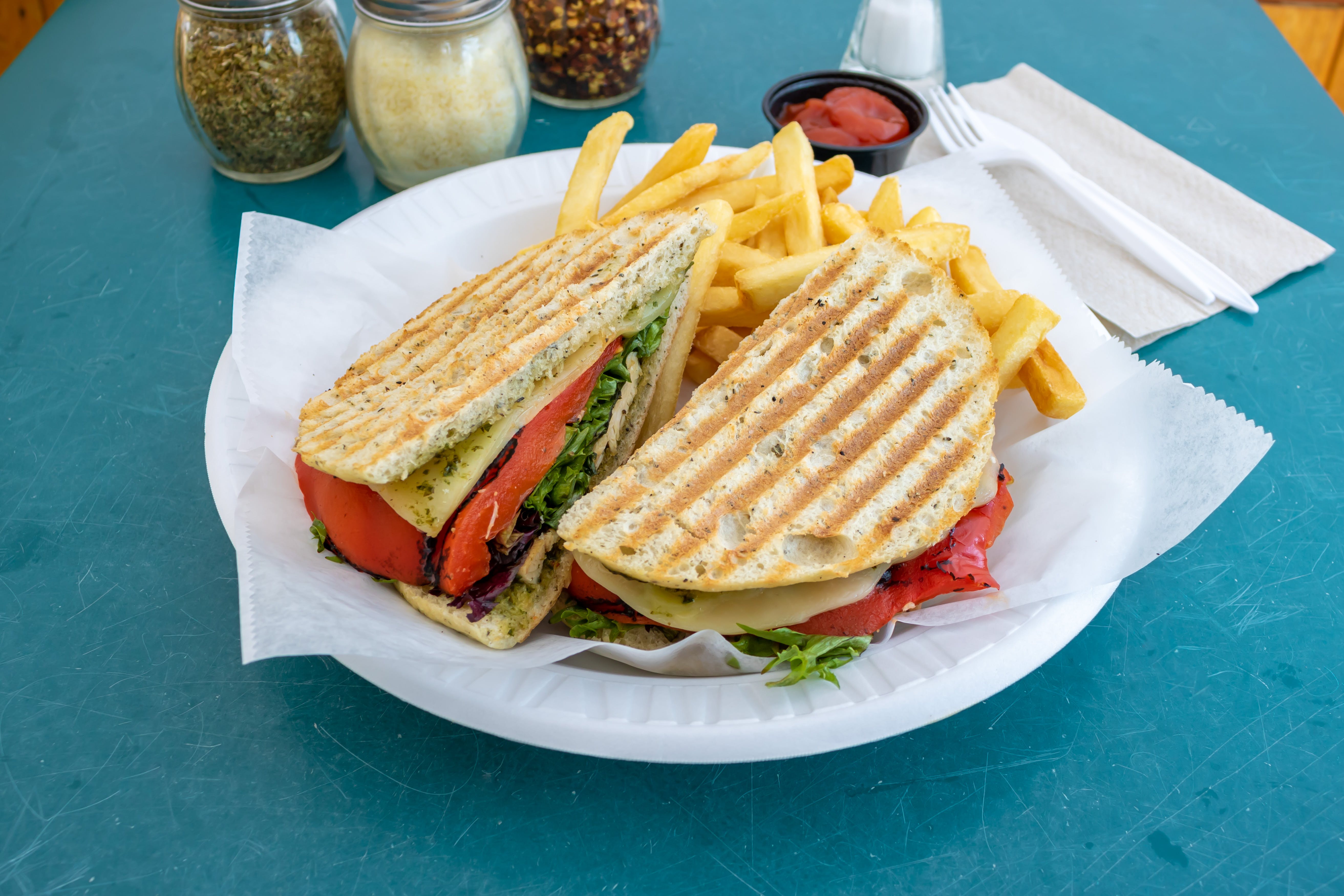 Order The Grilled Campagnolo Panini - Panini food online from T J's Pizza & Pasta store, Lawrence on bringmethat.com