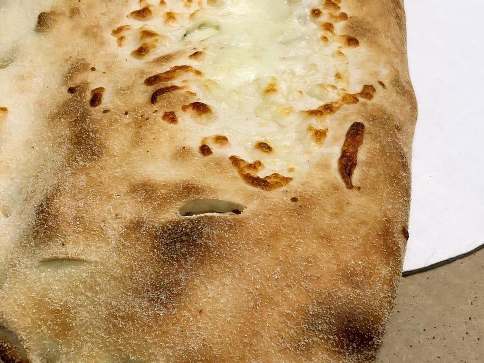 Order FOUR CHEESE CALZONE food online from Lisa's Family Pizzeria store, Wakefield on bringmethat.com