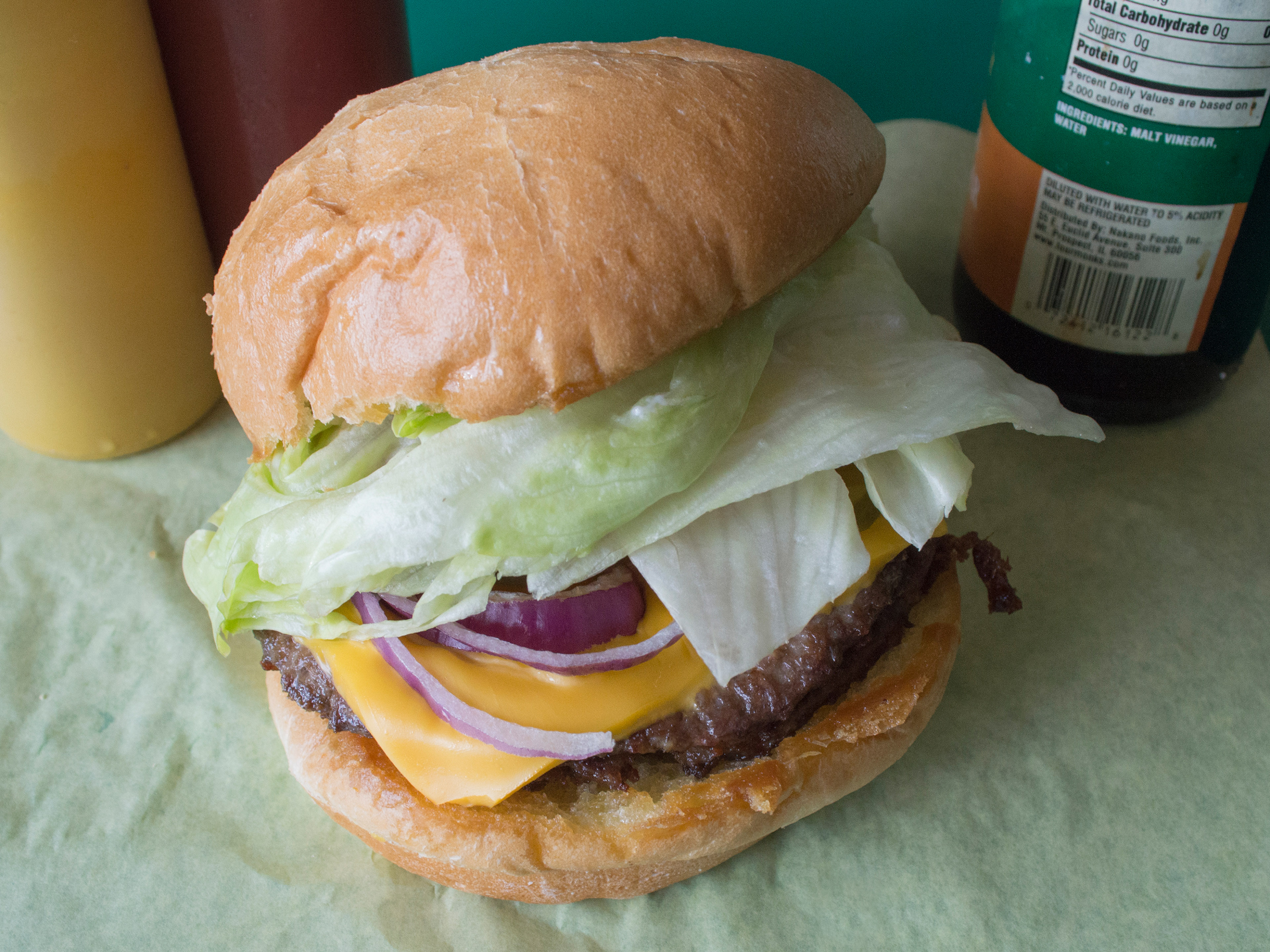 Order 1/3 lb. Cheeseburger food online from Wiener Works store, Sacramento on bringmethat.com