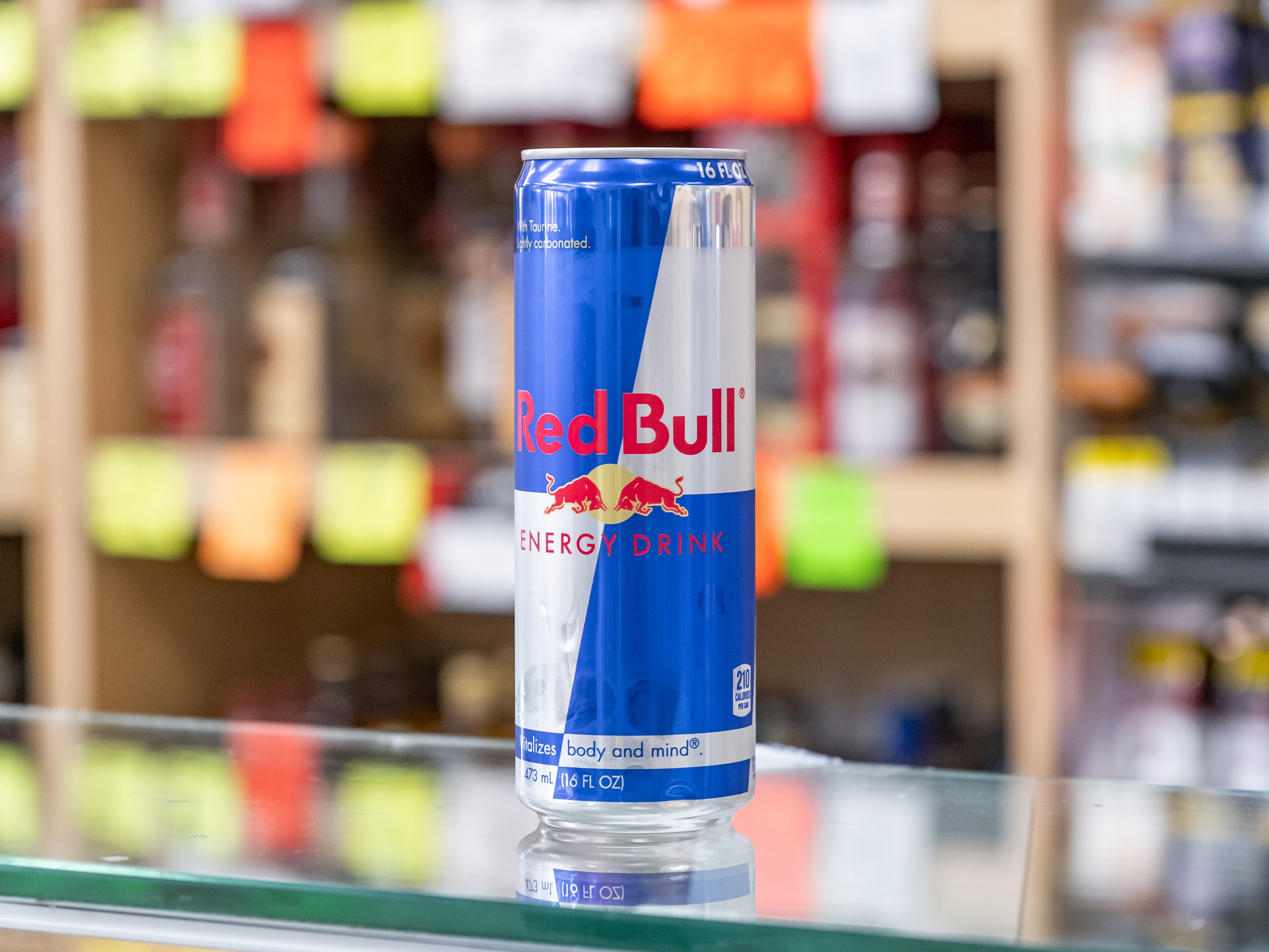 Order Red Bull food online from Circle S Food Store store, Orange on bringmethat.com