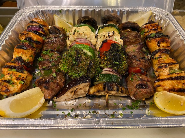 Order Family Skewer Meal for 4 food online from Moussaka Mediterranean Kitchen store, San Leandro on bringmethat.com