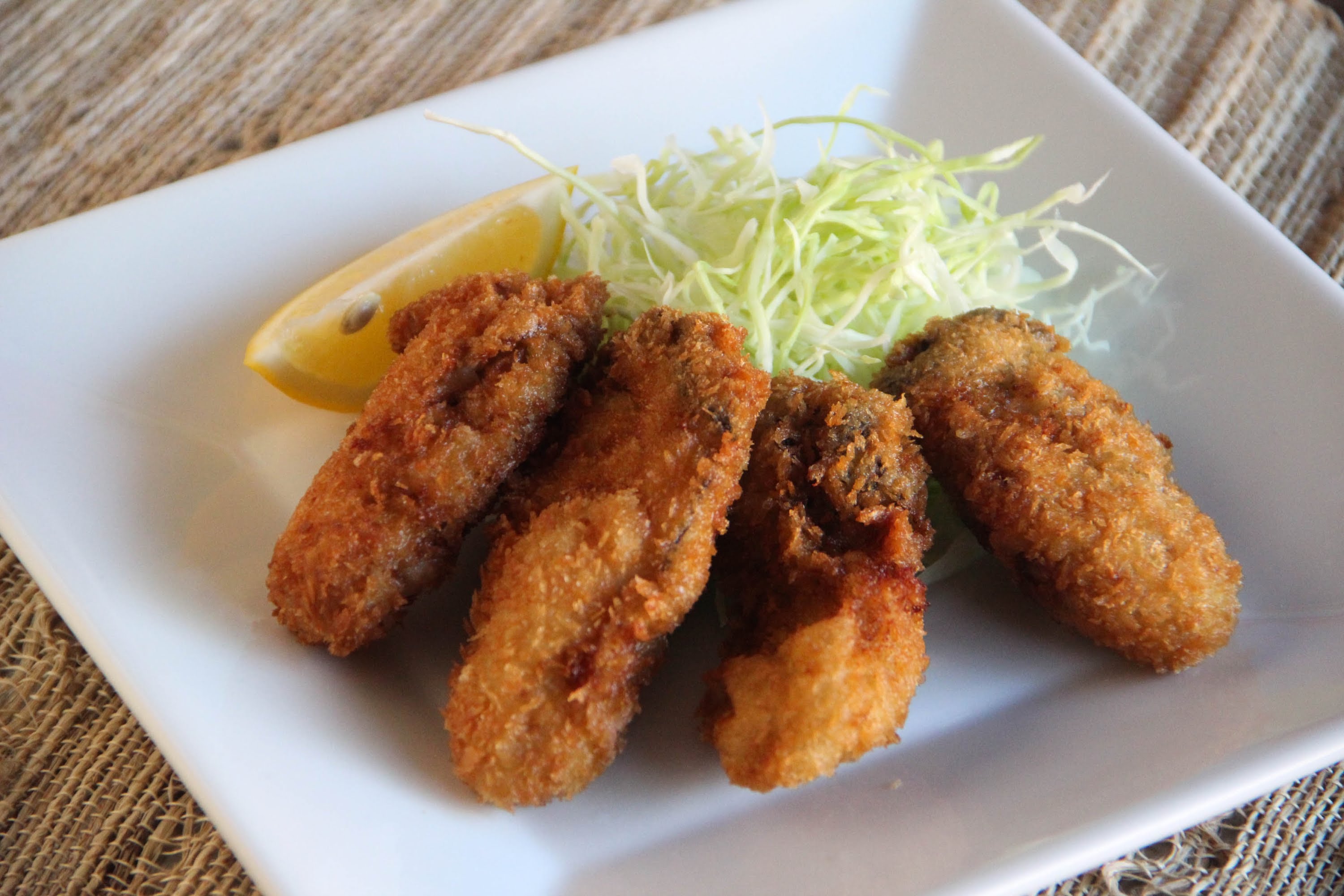 Order Fried Oysters food online from Tom Kha Thai Asian Bistro store, Fort Collins on bringmethat.com