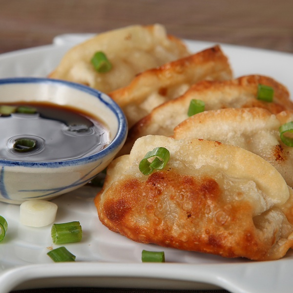 Order Gyoza food online from Red Curry Thai Cuisine store, Dallas on bringmethat.com