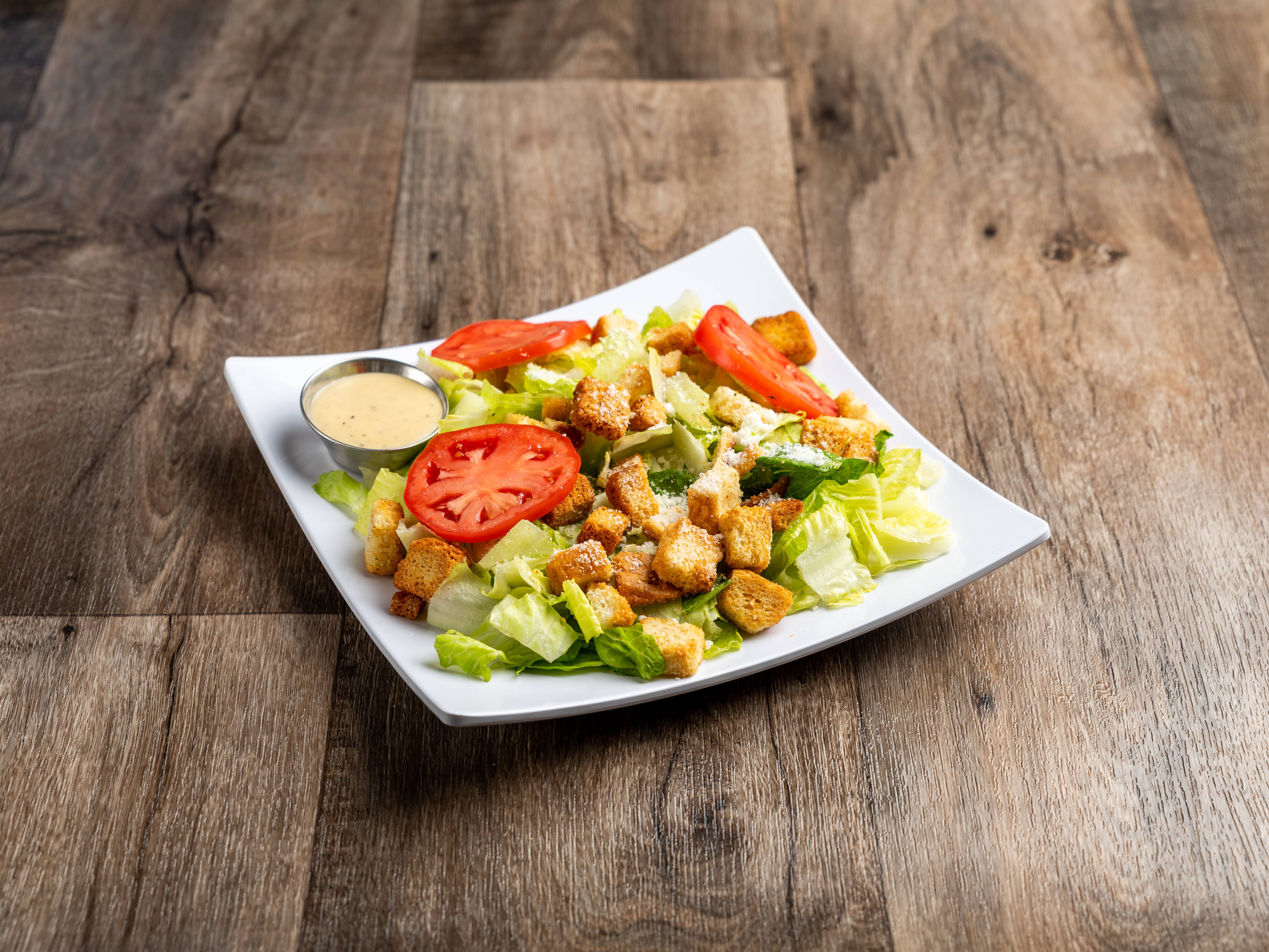 Order Caesar Salad food online from Universal Pizza & Subs store, Baltimore on bringmethat.com