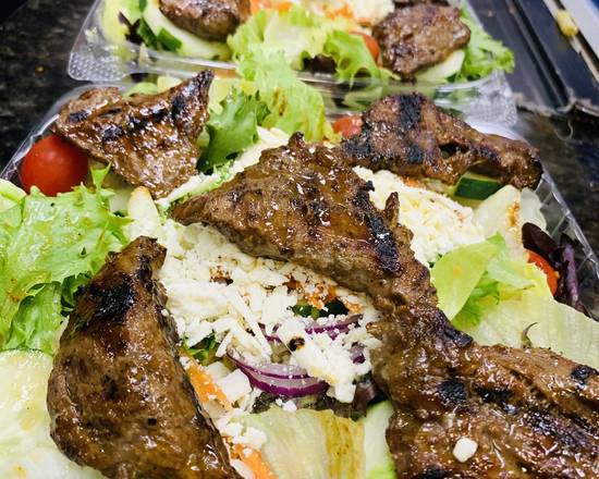 Order Steak Tip Salad food online from Old Country Pizzeria store, East Weymouth on bringmethat.com