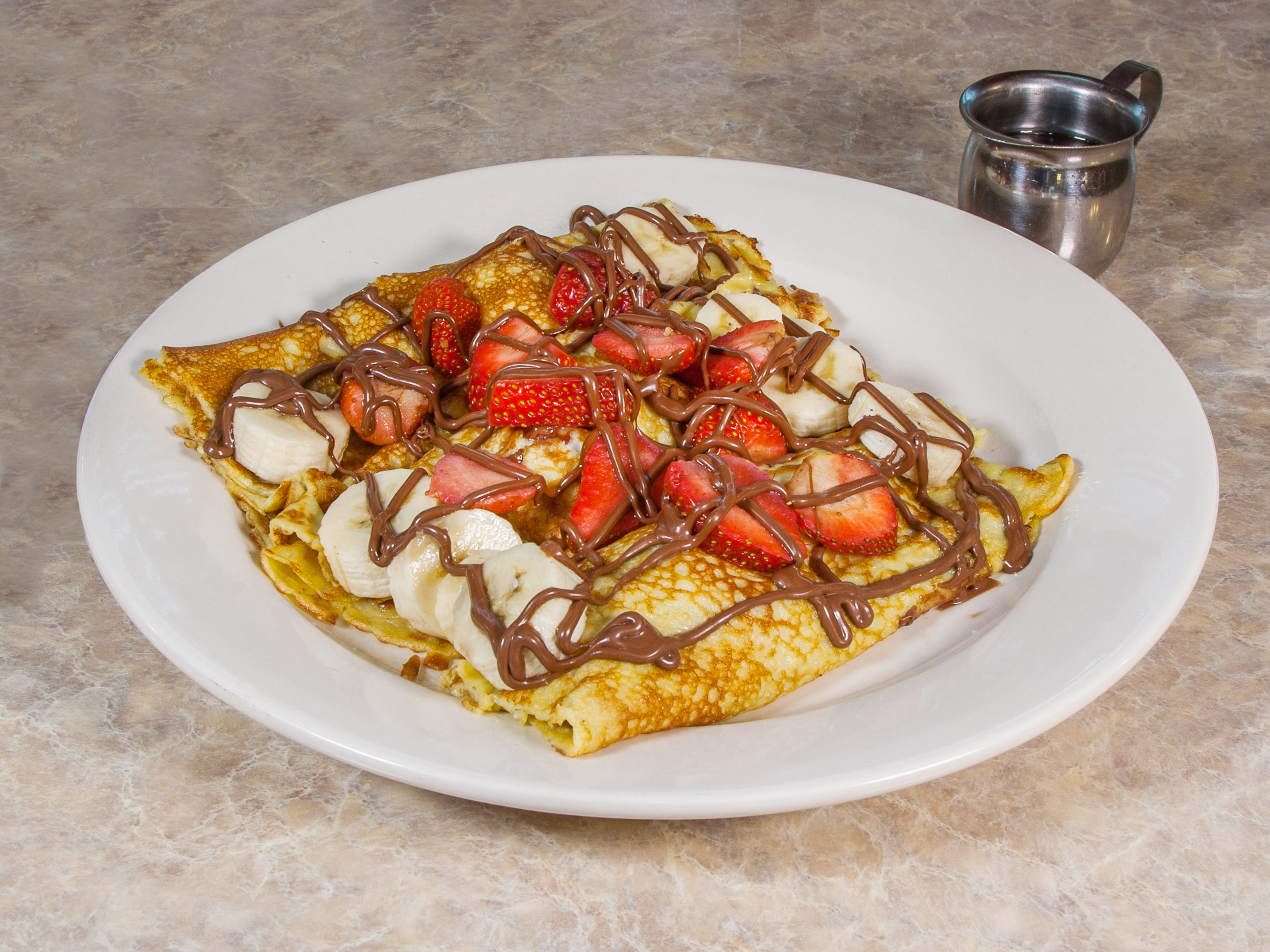 Order Nutella Crepes food online from Omega Restaurant store, Downers Grove on bringmethat.com