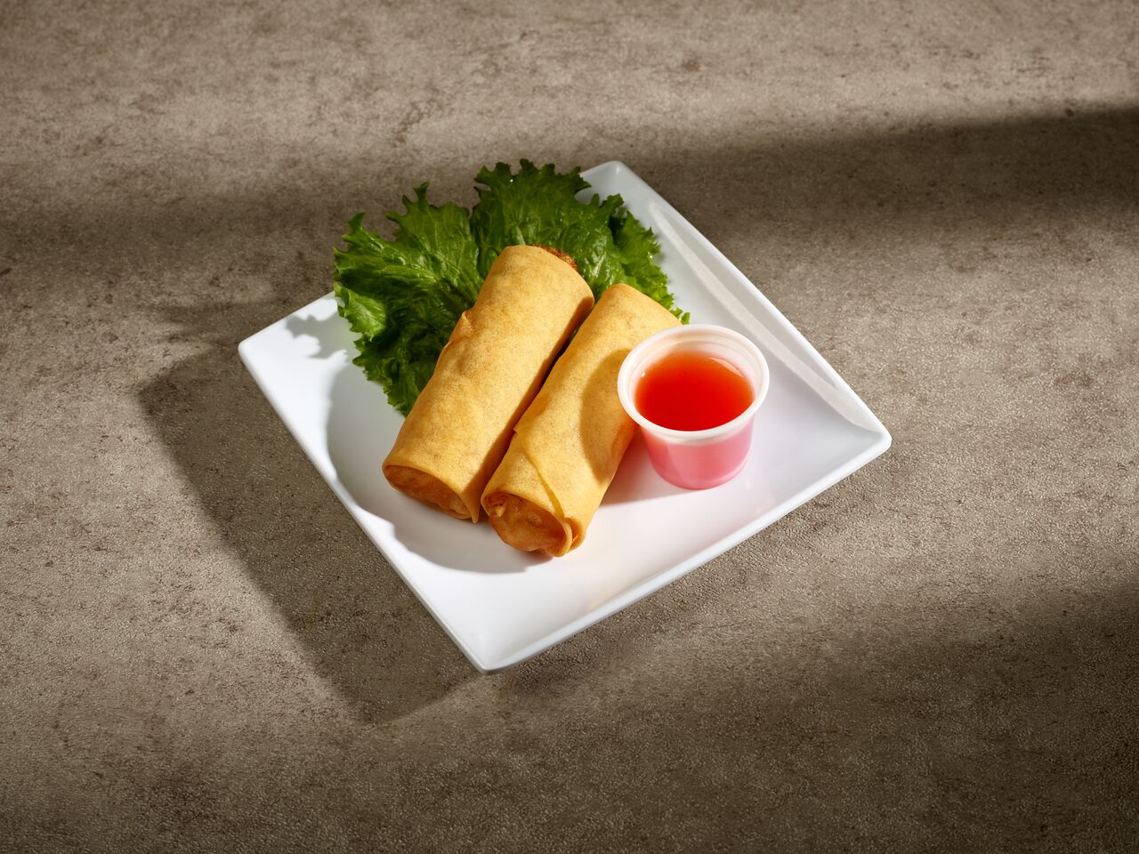 Order 2 Vegetable Egg Rolls food online from Huang's Ya Ting Chinese Restaurant store, Aurora on bringmethat.com