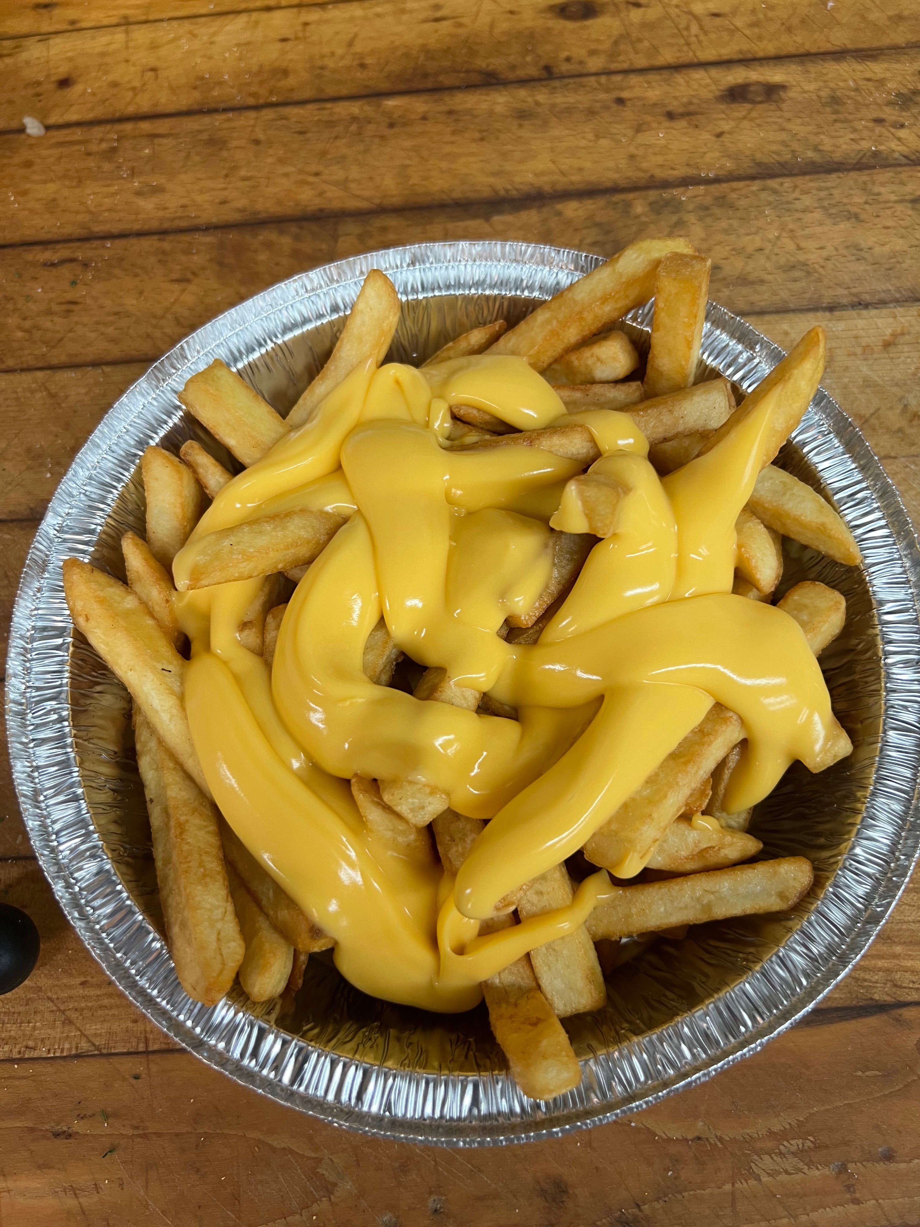 Order Cheese Fries - Side food online from Andre's Pizza store, Oxford on bringmethat.com