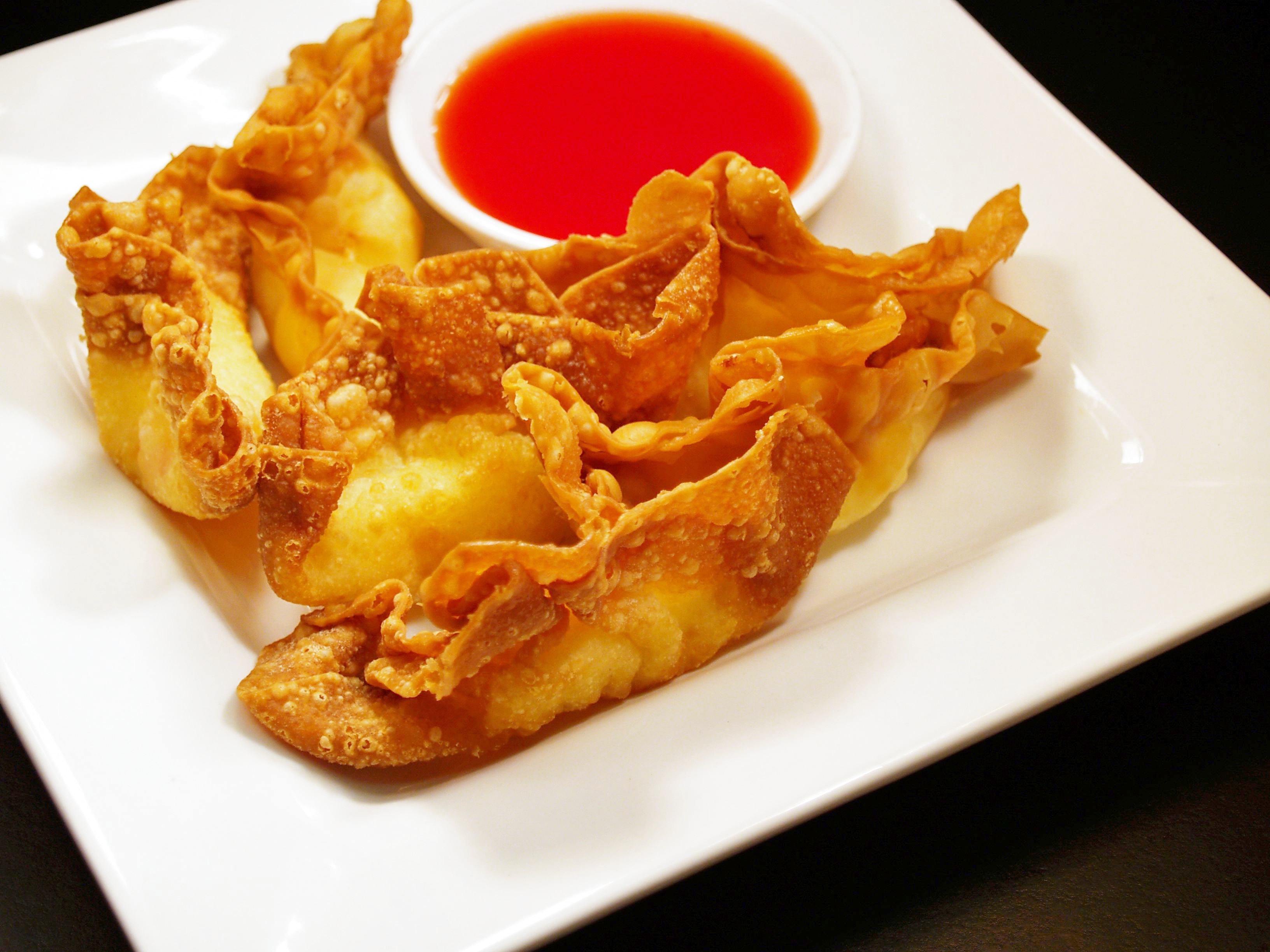 Order 10A. Crab Rangoons food online from Chef Ming's Kitchen store, Beverly Hills on bringmethat.com