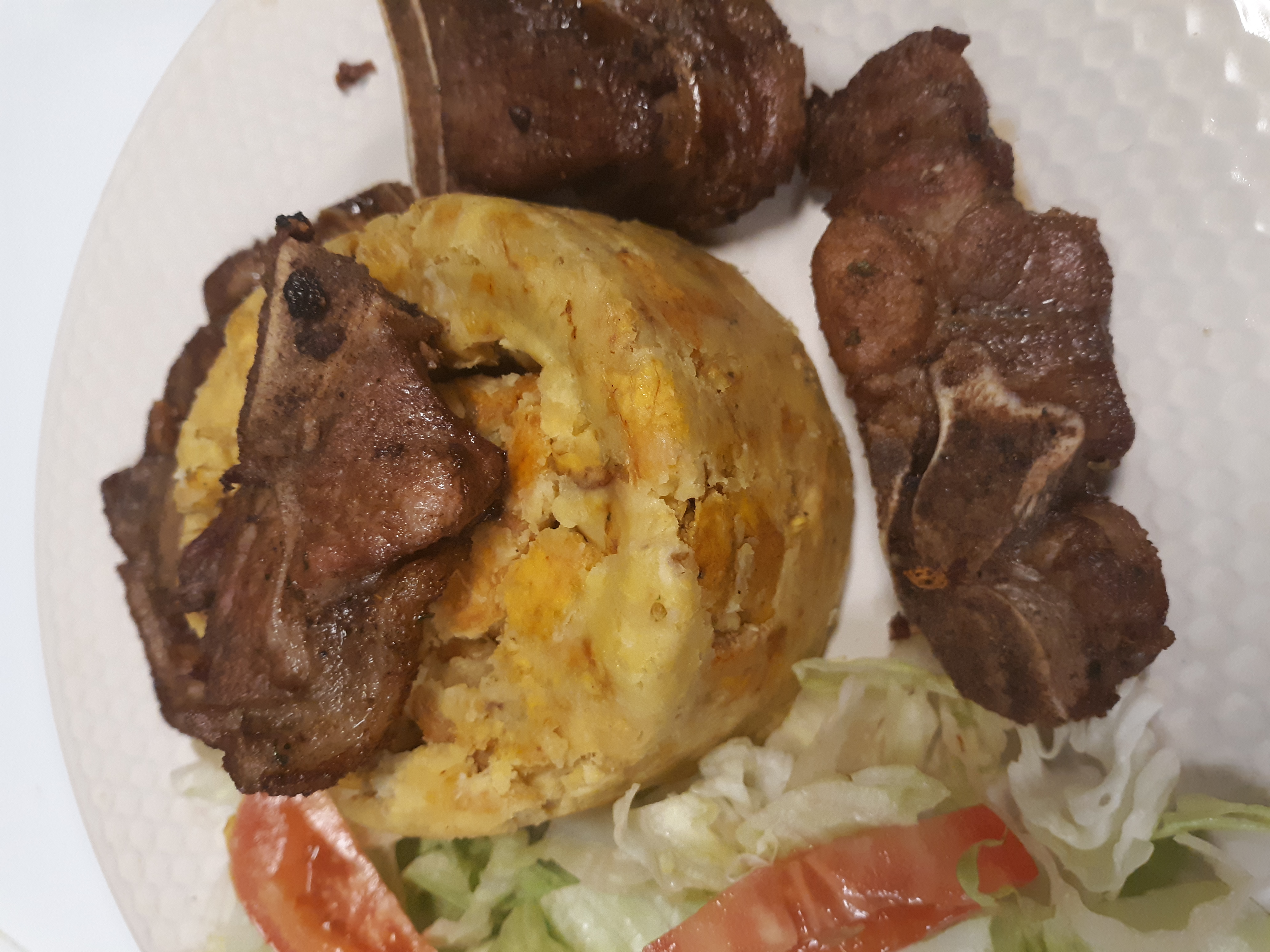 Order Chuleta mofongo/PORK chop food online from Oscar's Kitchen store, Bronx on bringmethat.com
