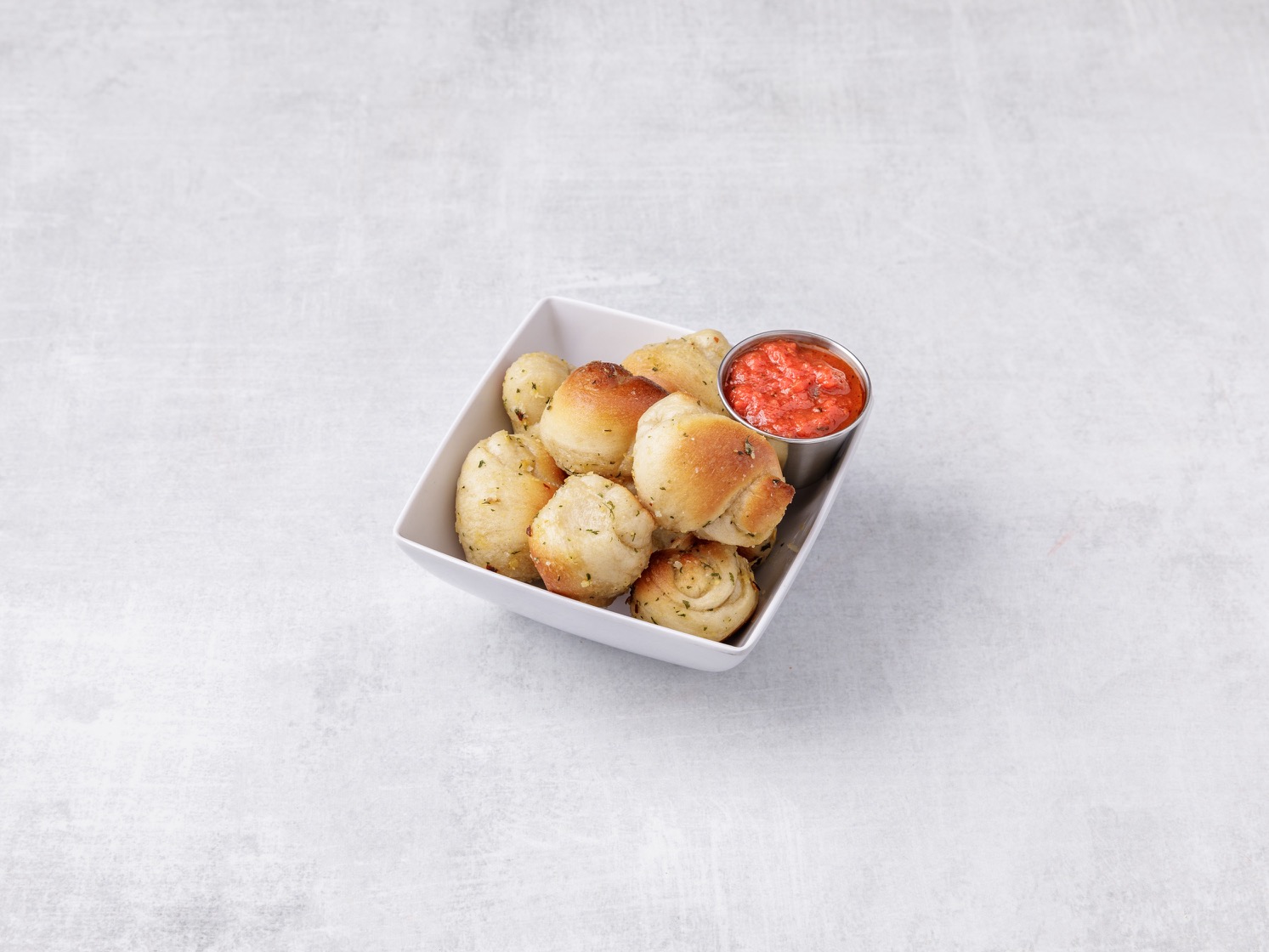Order 8 Piece Garlic Knots with Sauce food online from Vito Pizza store, Vineland on bringmethat.com