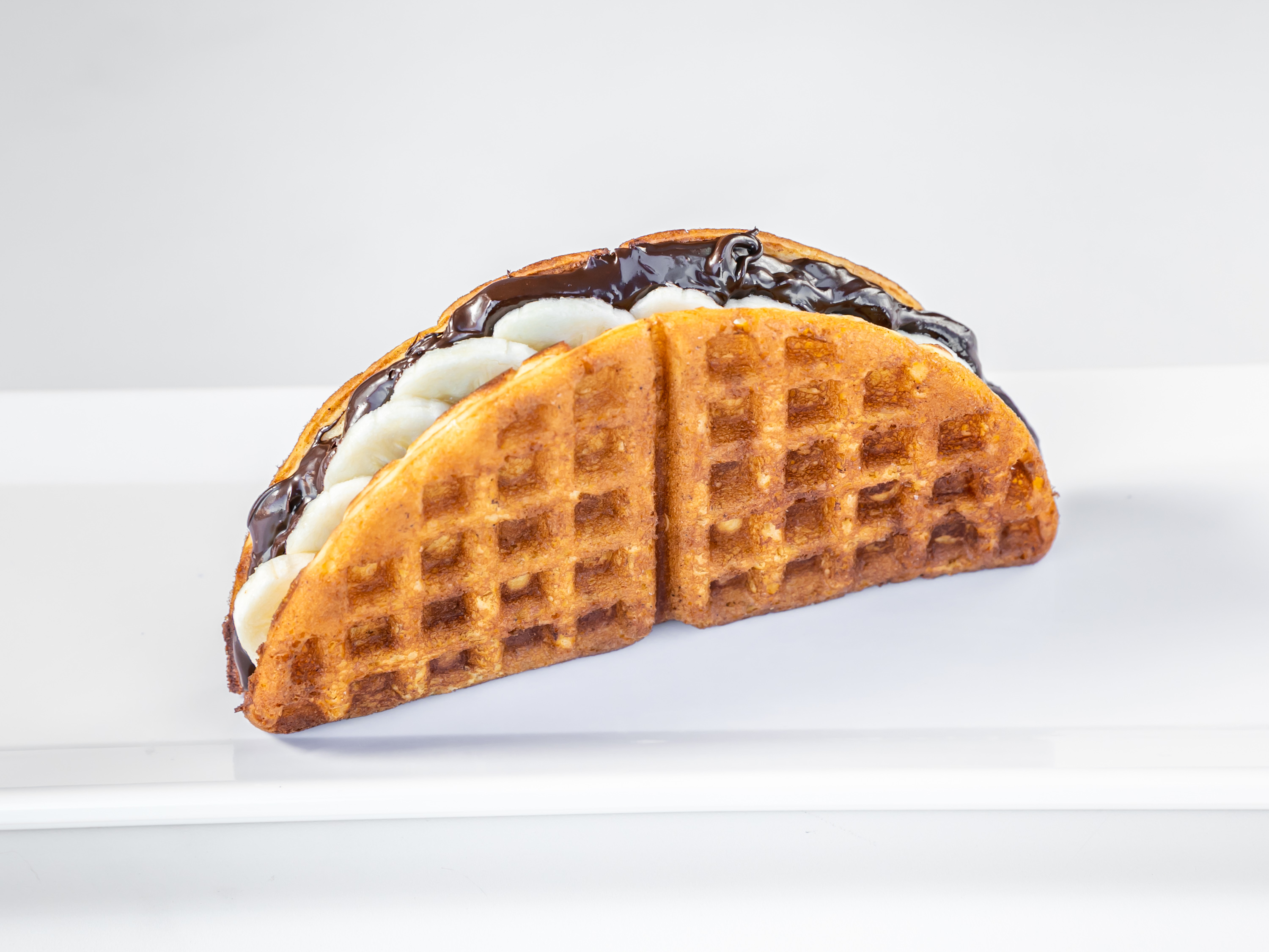 Order Banana and Chocolate Waffle Sandwich food online from Famous Waffle Sandwich store, San Diego on bringmethat.com