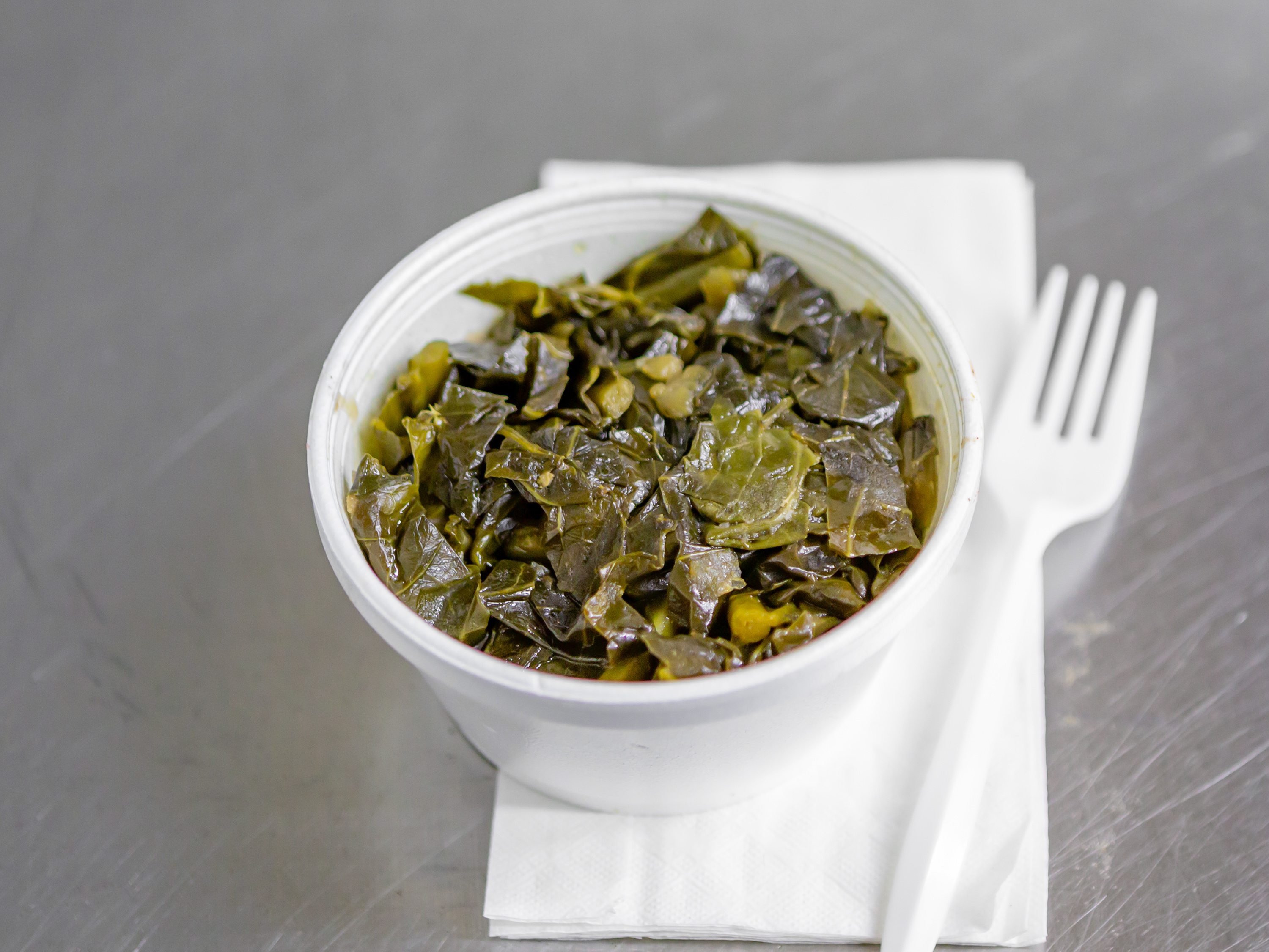 Order Collard Greens food online from Uptown BBQ & Soulfood store, Detroit on bringmethat.com