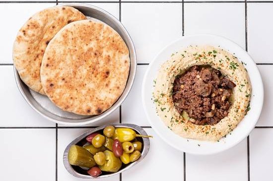 Order Hummus Meat food online from 12 chairs store, New York on bringmethat.com