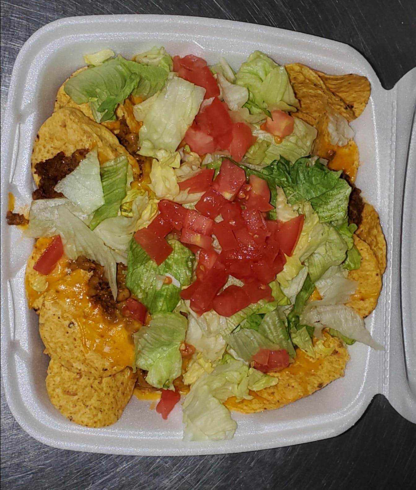 Order Nachos Deluxe - Nacho food online from Northside Pizza store, Hastings on bringmethat.com