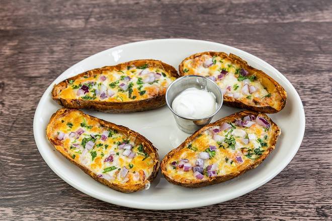 Order BBQ Chicken Potato Skins food online from Wood Ranch Bbq & Grill store, Irvine on bringmethat.com