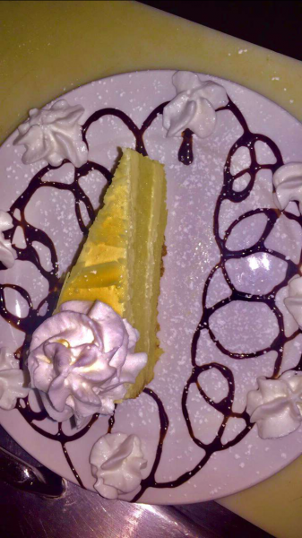 Order Limoncello Cake food online from Cafe La Bellitalia store, Madison on bringmethat.com