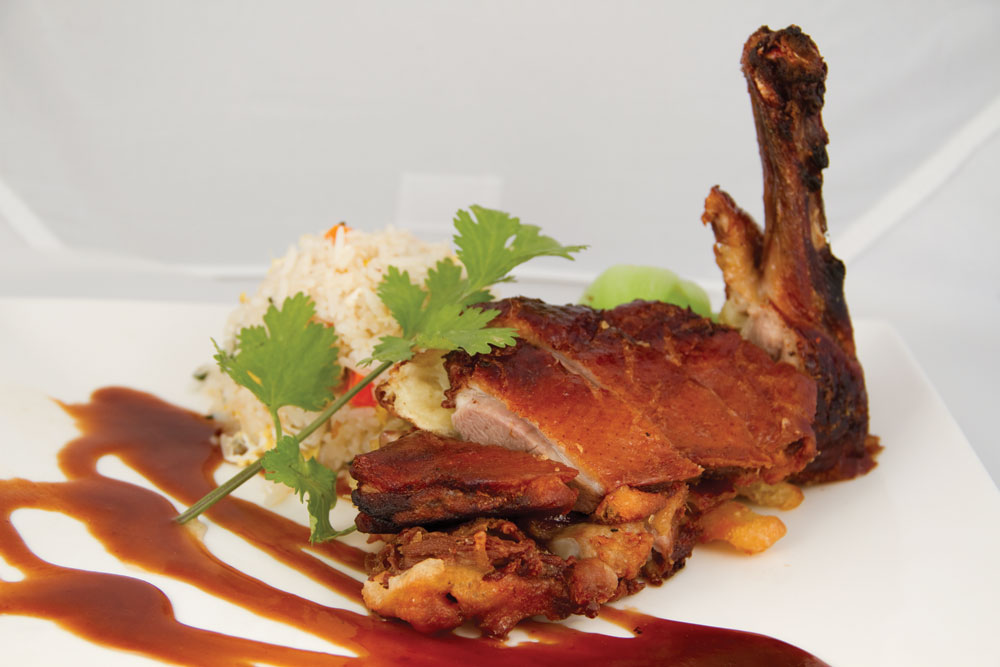 Order Crispy Duck with Fried Rice food online from Wild Ginger store, Bronxville on bringmethat.com