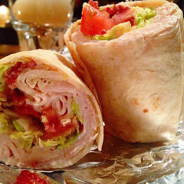Order Turkey Club Wrap - Wrap food online from Dominic Pizza store, Voorhees Township on bringmethat.com