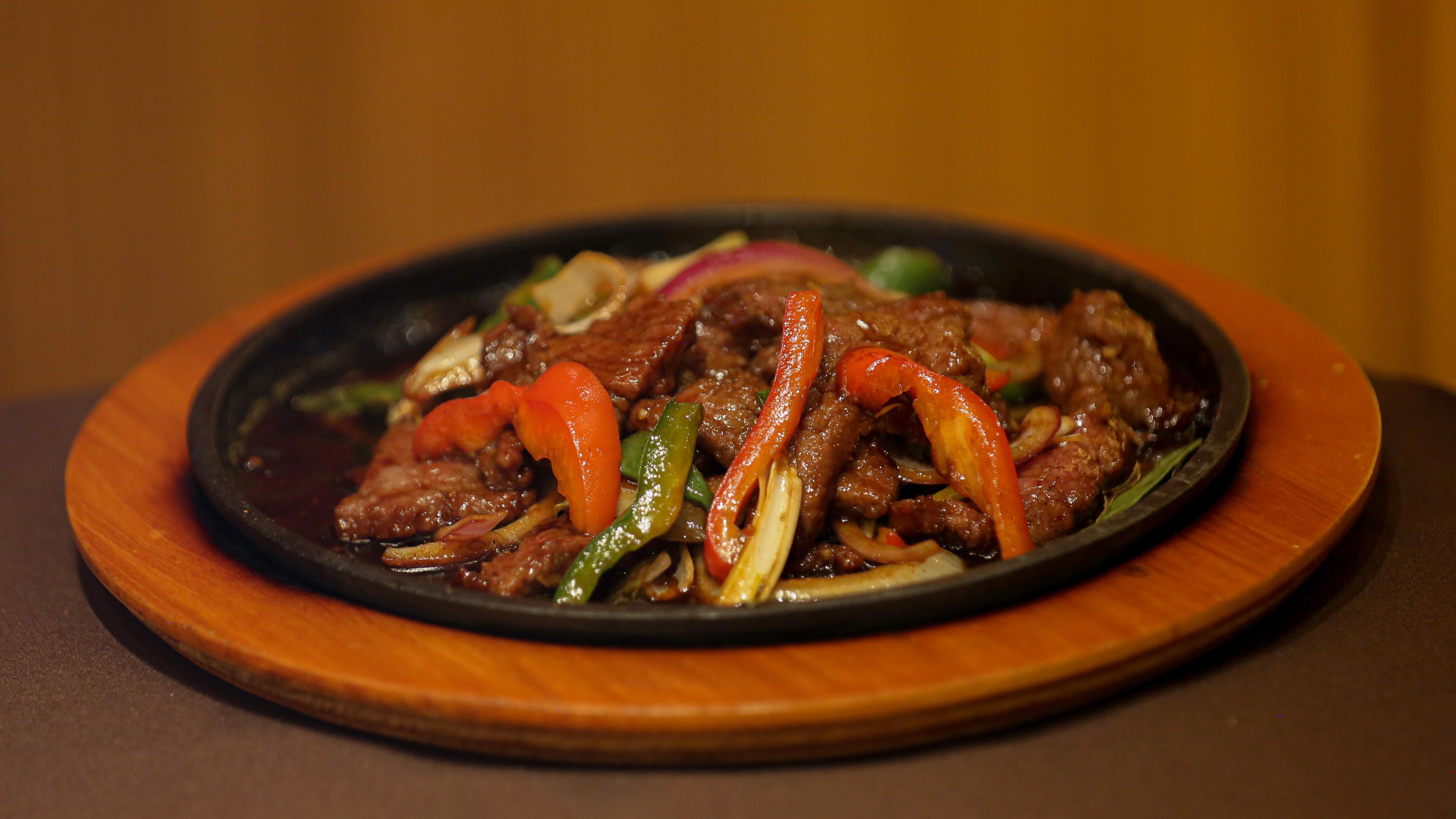 Order Mongolian Skillet Beef food online from MoCA Asian Bistro - Queens store, Forest Hills on bringmethat.com